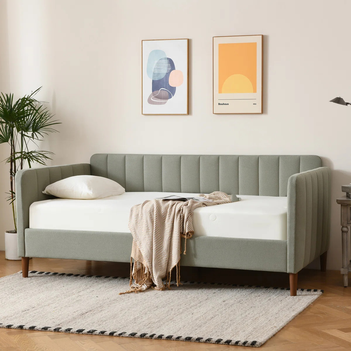 This upholstered daybed features a clean-lined silhouette that brings a modern look to your space... | Wayfair North America