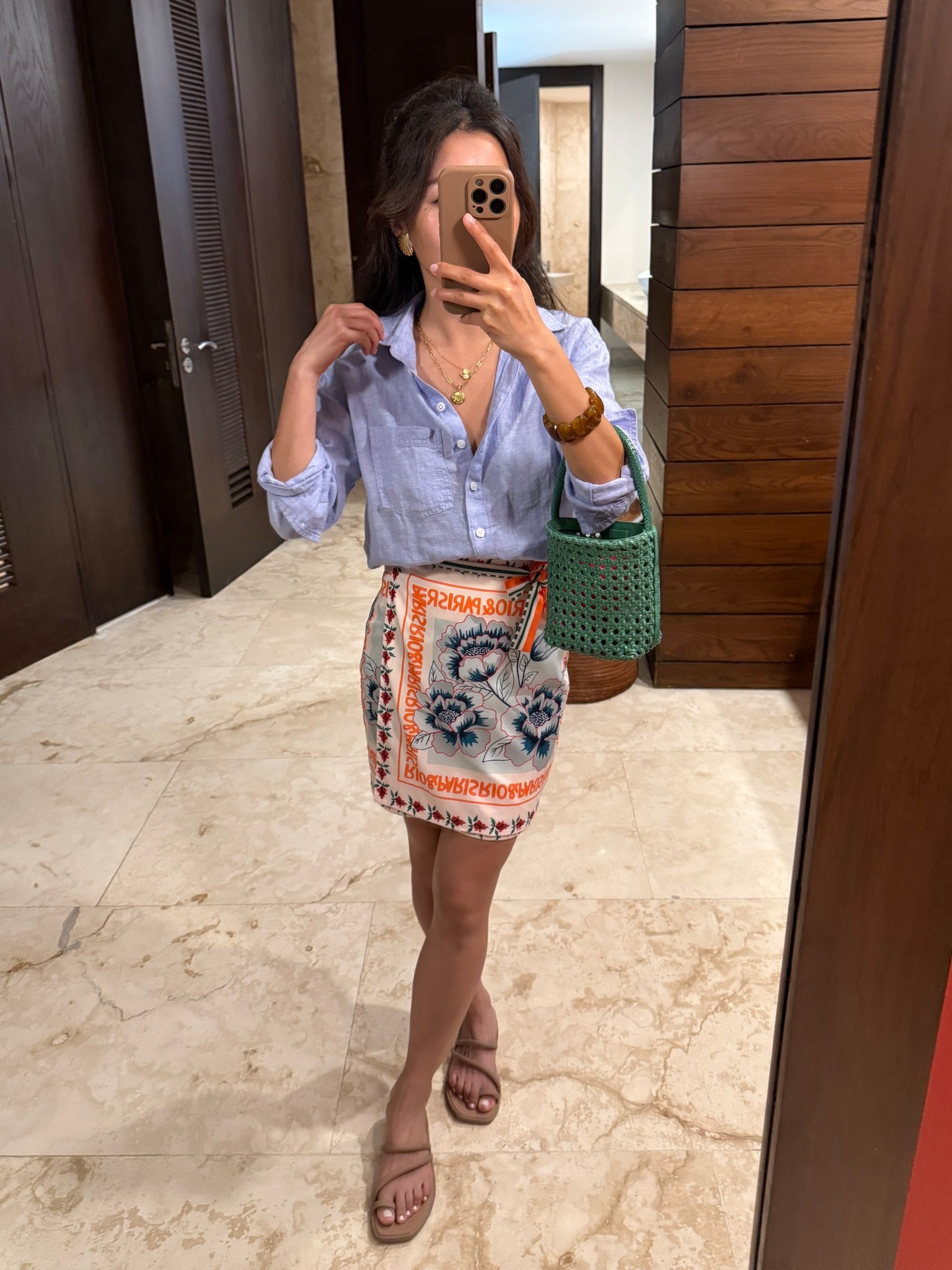 Amazon vacation find. Adorable silky soft wrap skirt also doubles as swim cover up

• Jcrew linen button down shirt 00 petite

• Amazon side tie wrap skirt xs

• Crocs sandals size 5, size down if between sizes

• old Madewell mini bag 

Printed skirt, summer vacation outfit, resort wear

#LTKPetite #LTKTravel #LTKSeasonal