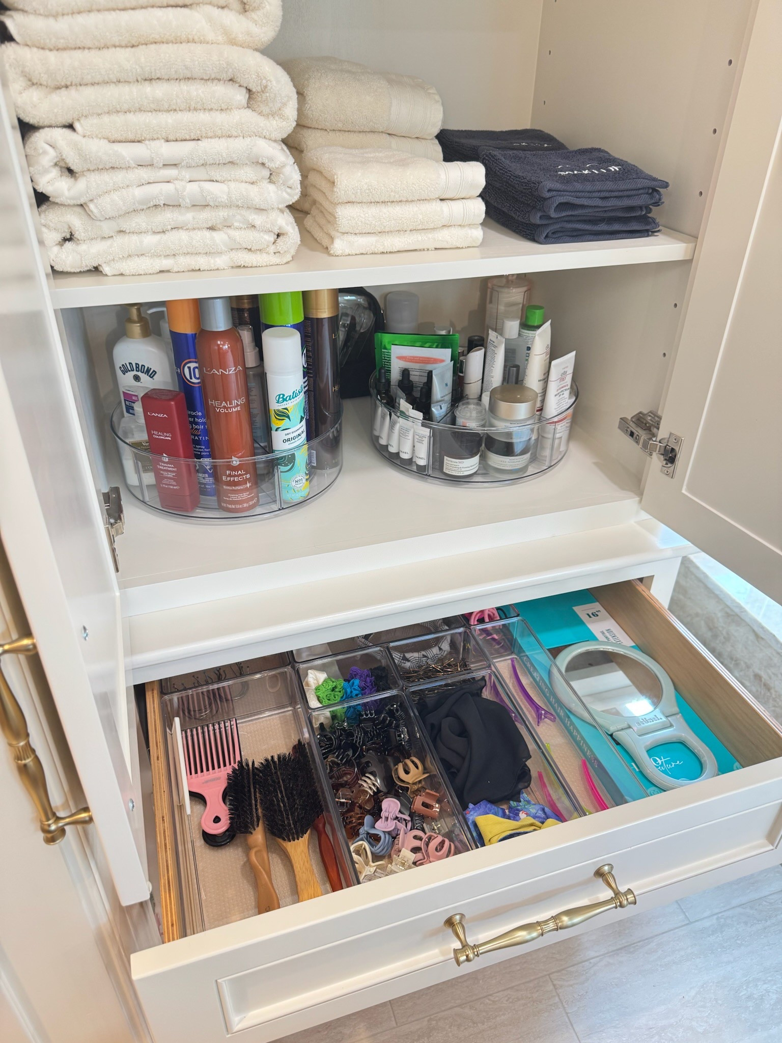 We say this all the time because it’s true. Most of the time, clutter isn’t a character flaw it’s a sign that your home doesn’t have systems that work for you.

When everything has a place (and it’s easy to put things back), your space becomes easier to maintain — not just on day one, but long after.
Whether it’s a mudroom drop zone, labeled bins in the pantry, or a bathroom drawer that actually makes sense — organization isn’t about being perfect. It’s about creating systems that fit your life. Ready to get organized? Call us!

We are professional organizers located in Lafayette, LA we love helping our clients get organized and stay organized. We bring function and beauty to every organizing project. 
