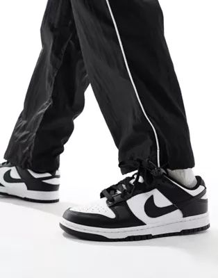 Nike Dunk Low Retro sneakers in white and black | ASOS (Global)