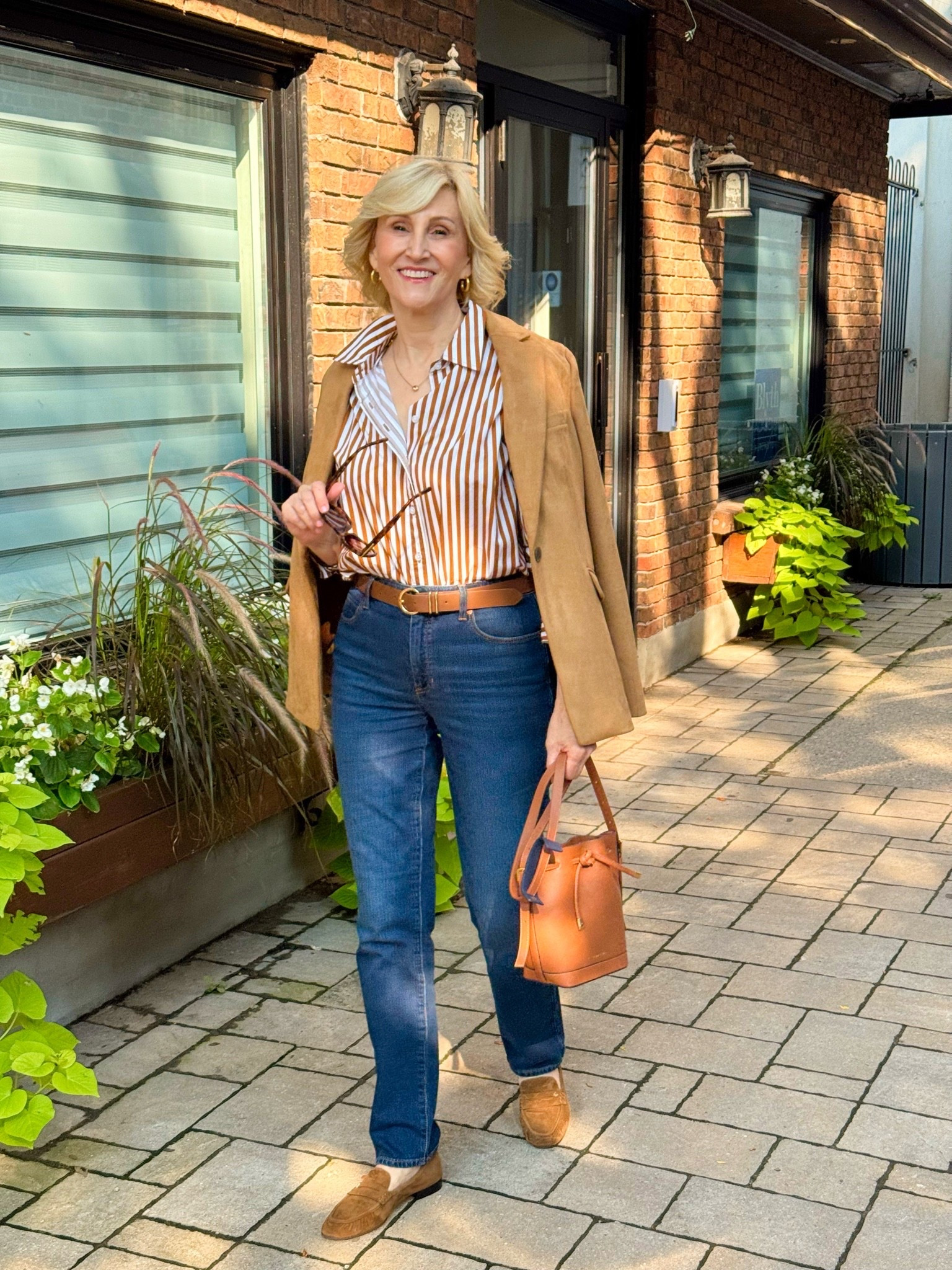 I’m always a sucker for an outfit that feels polished without feeling like I tried too hard—and this one checks all the boxes. 🤎

I love the combination of this camel-and-white striped collared shirt with the faux suede jacket. Add my favorite denim and a pair of loafers, and you have one of those easy outfits I could reach for all season long.

It’s classic, comfortable, and just pulled-together enough for everything from running errands to lunch with a friend.

#LTKSeasonal #LTKOver40 #LTKootd