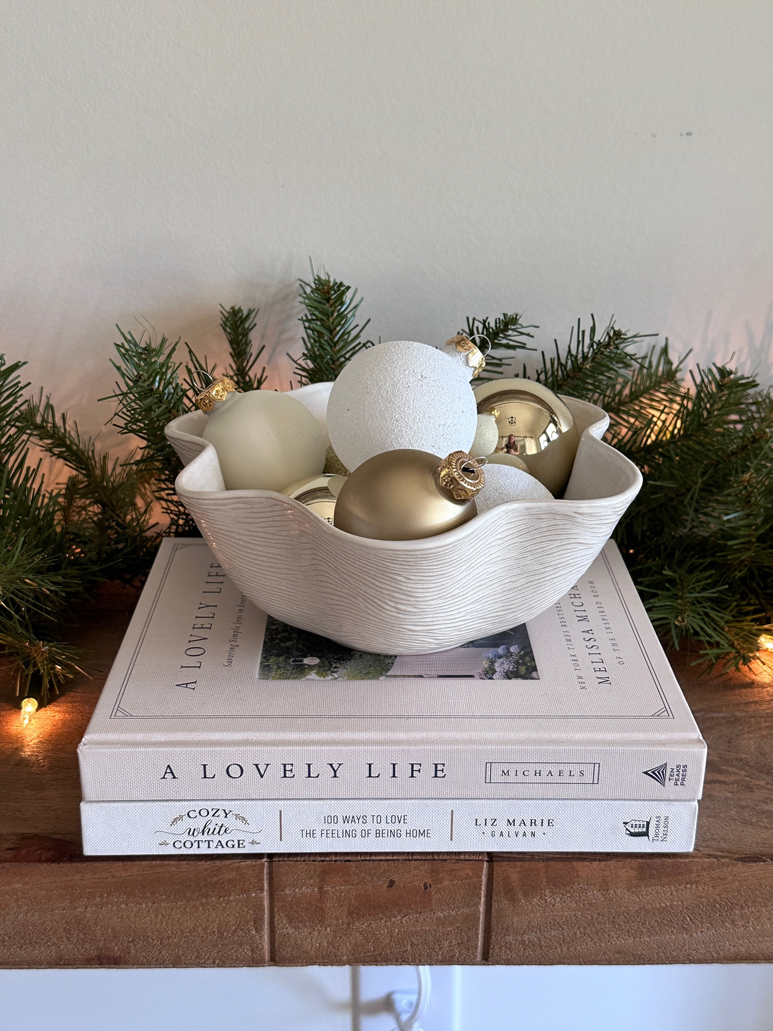 Holiday Christmas decorations in my foyer. Garland, ornaments

#LTKHome #LTKHoliday #LTKSeasonal