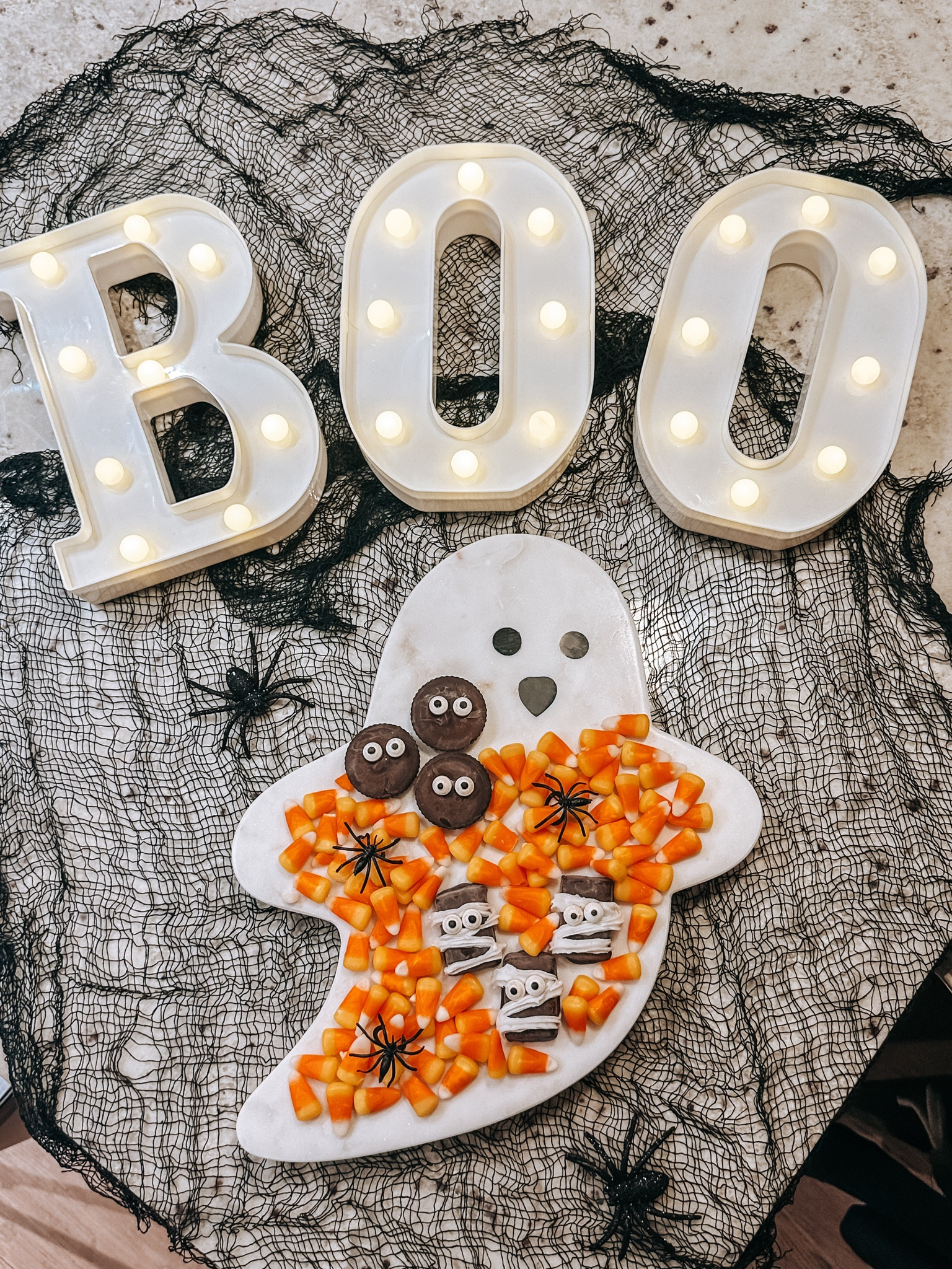 A sweet treat board with my favorite chocolate candy!!! And love my “BOO” lights! 

#LTKHome #LTKSeasonal #LTKFamily