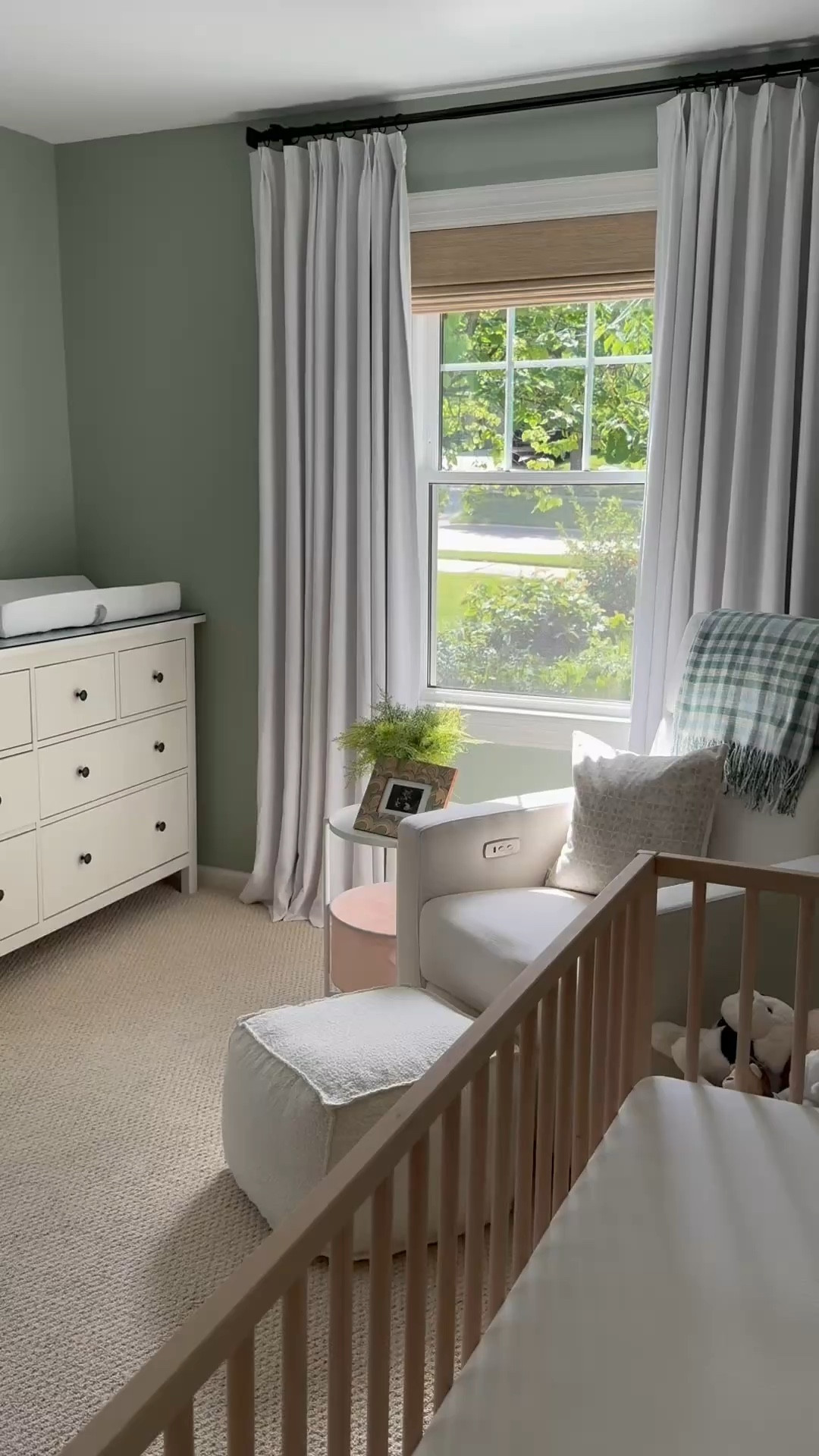 Upgrading to cordless blinds in the nursery was a top priority for me. I partnered with @twopagescurtains to make this space a little safer for when the baby arrives #twopageshome

Nursery glider. Nursery chair. Pouf. Ottoman. Accent table. Side table. Drapes. Curtains. Blackout blinds. Blackout curtains. Scalloped shelves. Nursery decor. Throw blanket. 

#LTKHome #LTKBaby #LTKBump