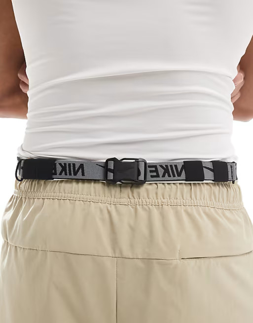 Nike slim waistpack in black and silver | ASOS | ASOS (Global)