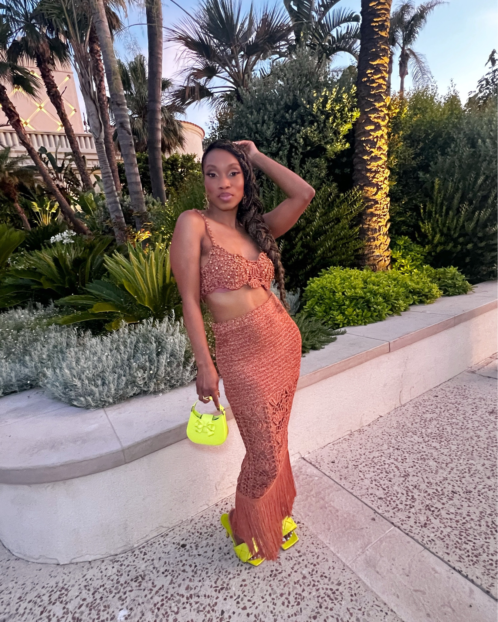 Palm-lined paths, warm dusk air, and that quiet pause before the evening fully arrives.
The kind of moment where texture matters, color speaks softly, and confidence doesn’t need an announcement.

This wasn’t about standing out.
It was about feeling grounded while glowing.
Letting the light catch what it catches and moving on anyway.

Some nights are about the destination.
Some nights are about how you hold yourself on the way there.

Both matter.

Think:

✔️ resort evening style
✔️ sunset dressing with intention
✔️ textured two-piece set
✔️ warm neutral tones with a twist
✔️ vacation glamour, unforced
✔️ statement accessories, softly done
✔️ confident silhouettes
✔️ tropical nights, elevated
✔️ bold femininity, balanced
✔️ soft luxury, after dark

For presence that speaks before you do ✨

#LTKootd #LTKPetite #LTKTravel