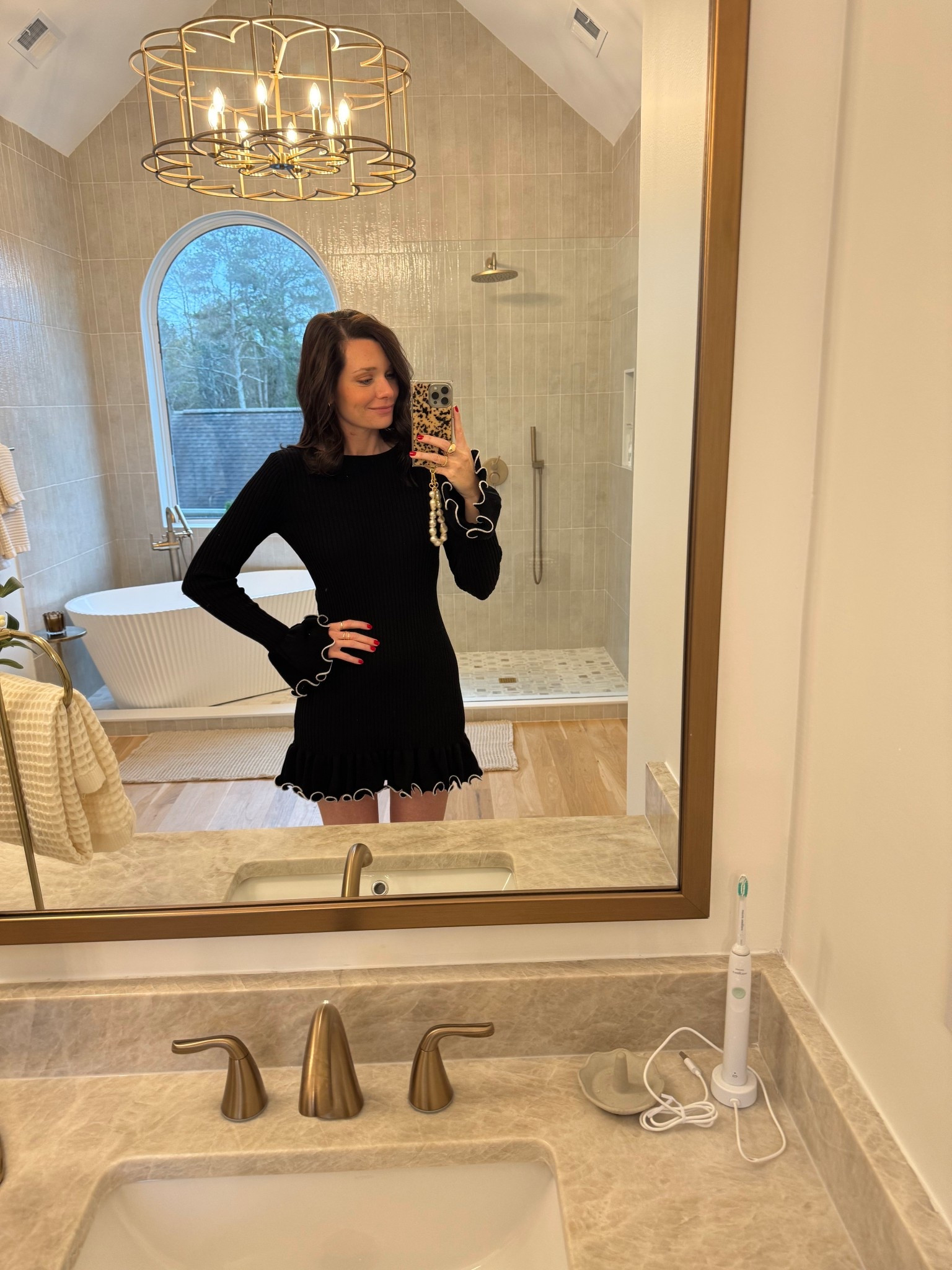 black dress, pearl phone strap, chic outfitt

#LTKSeasonal #LTKFindsUnder100 #LTKootd