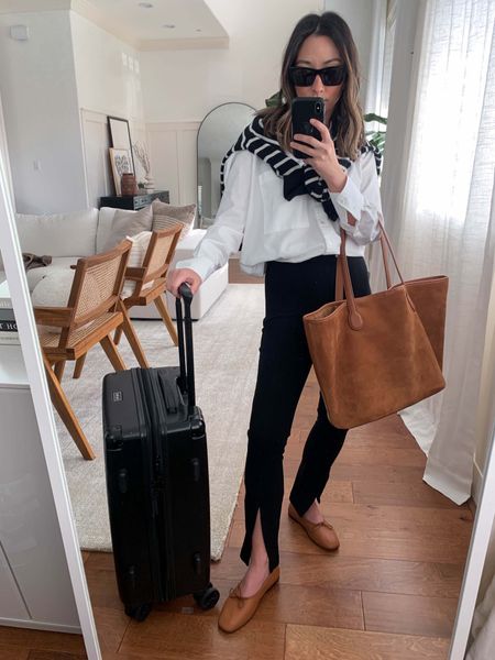 Travel airport style. Airport travel outfit ideas. Comfy travel outfits. 

Shirt - AYR xs
Sweater - J.crew (old). Liked similar. 
Leggings - Gap petite xs 
Tote - J.crew 
Flats - Everlane 5
Carryon - Calpak
Sunglasses - YSL
