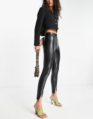 Topshop faux leather skinny trouser with front hem splits in black | ASOS (Global)