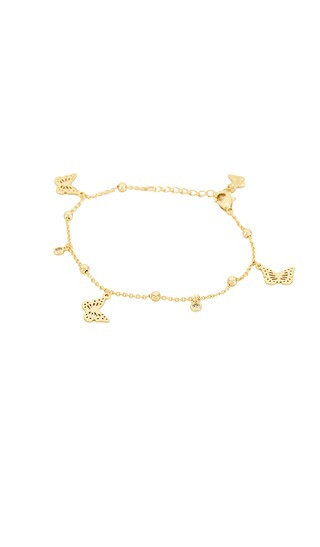 By Adina Eden Dangling Butterflies Charm Bracelet in Metallic Gold. | Revolve Clothing (Global)