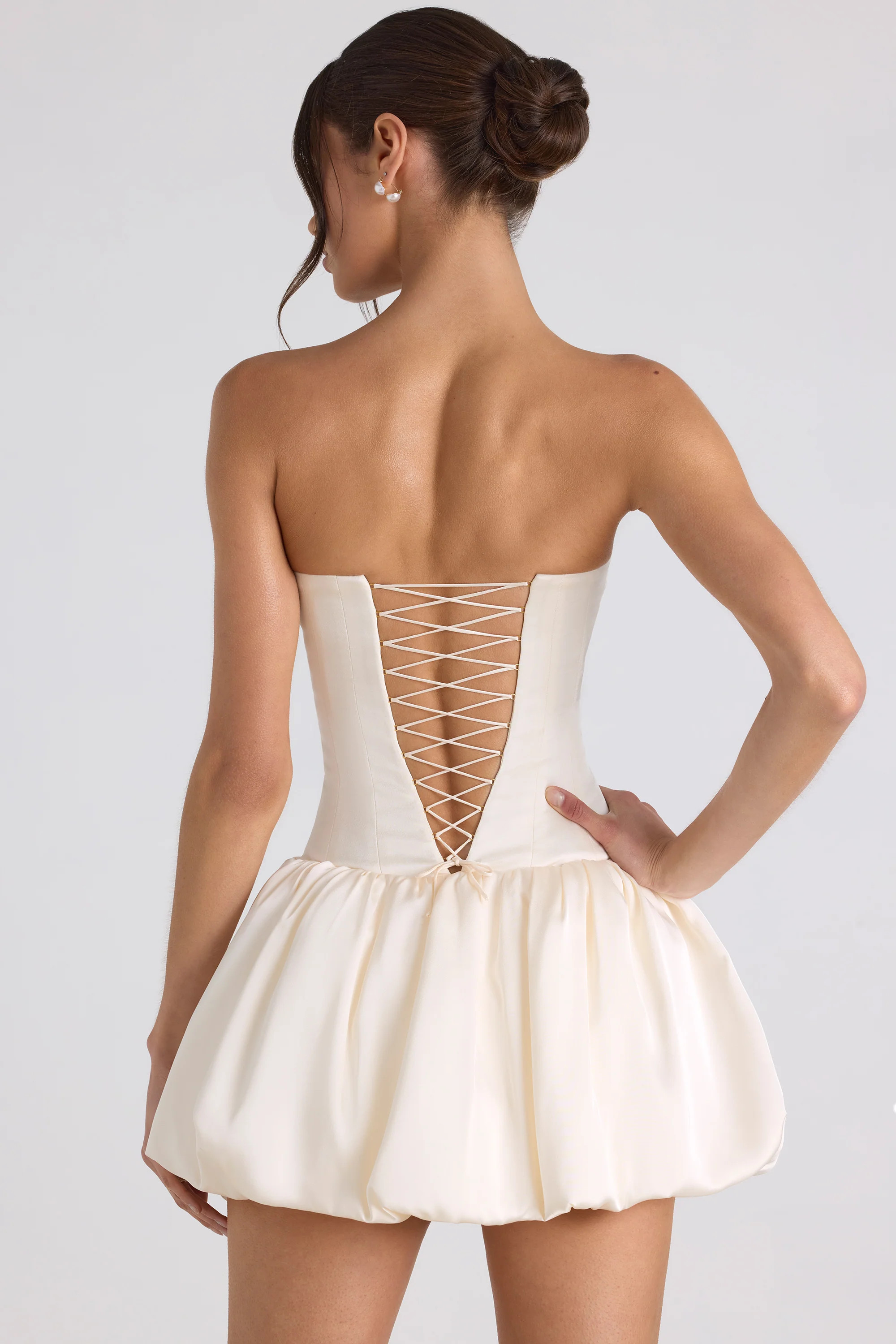 Lace-Up Bubble Hem Corset Mini Dress in Ivory | Oh Polly