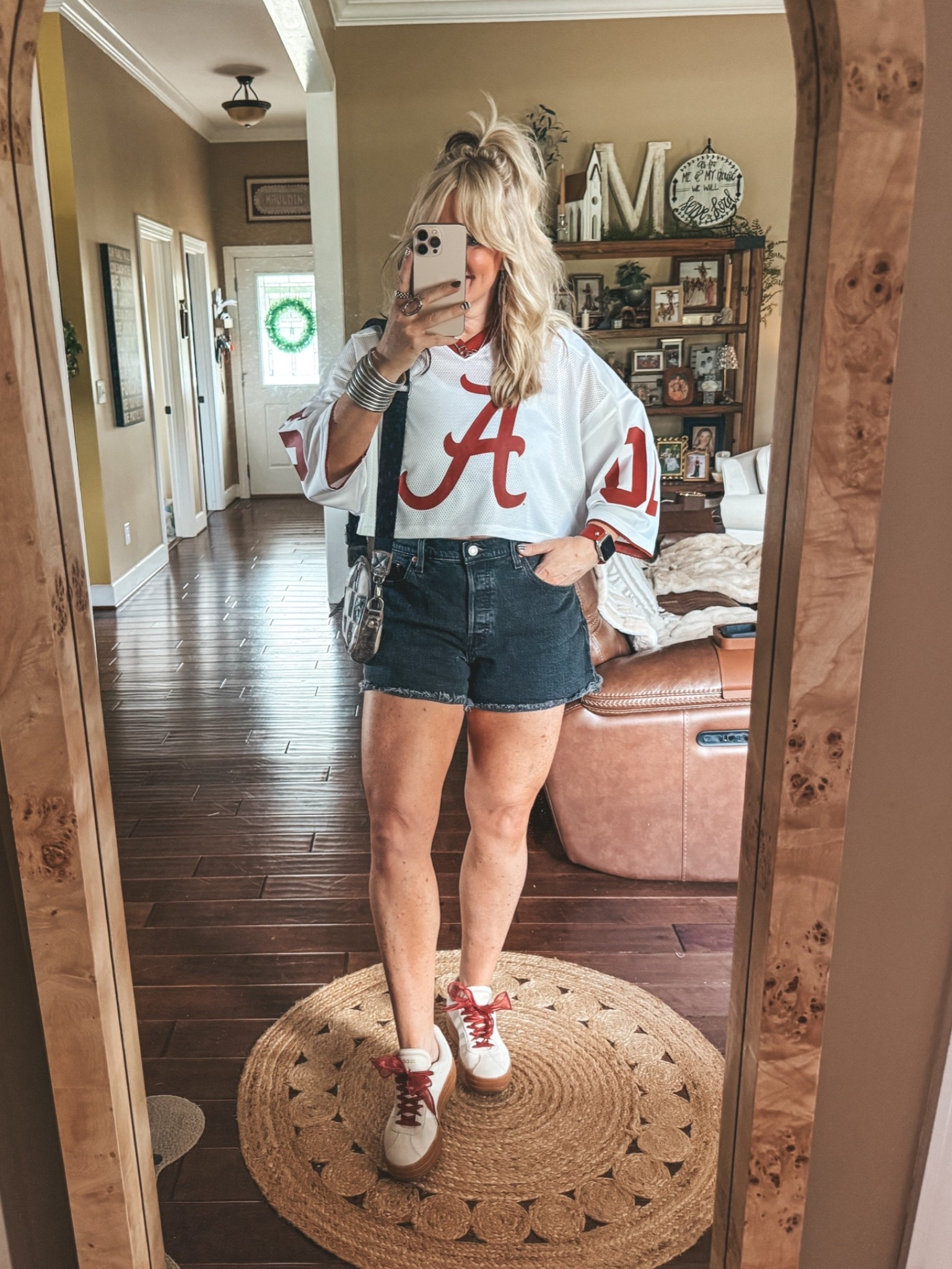 I sized down I’m this jersey but if you want more length is stay true to size. I’m in the 4/6. 
My shorts are Levi’s and I sized up. 
#gameday

#LTKootd #LTKOver40
