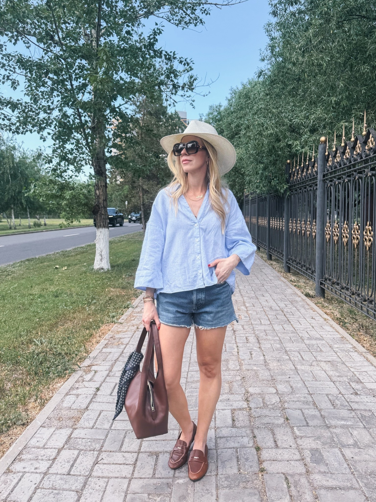 Casual summer outfit, linen blend shirt, cutoff denim shorts, @Zara leather loafers, @Janessa Leone white straw hat

#LTKSeasonal #LTKOver40 #LTKTravel