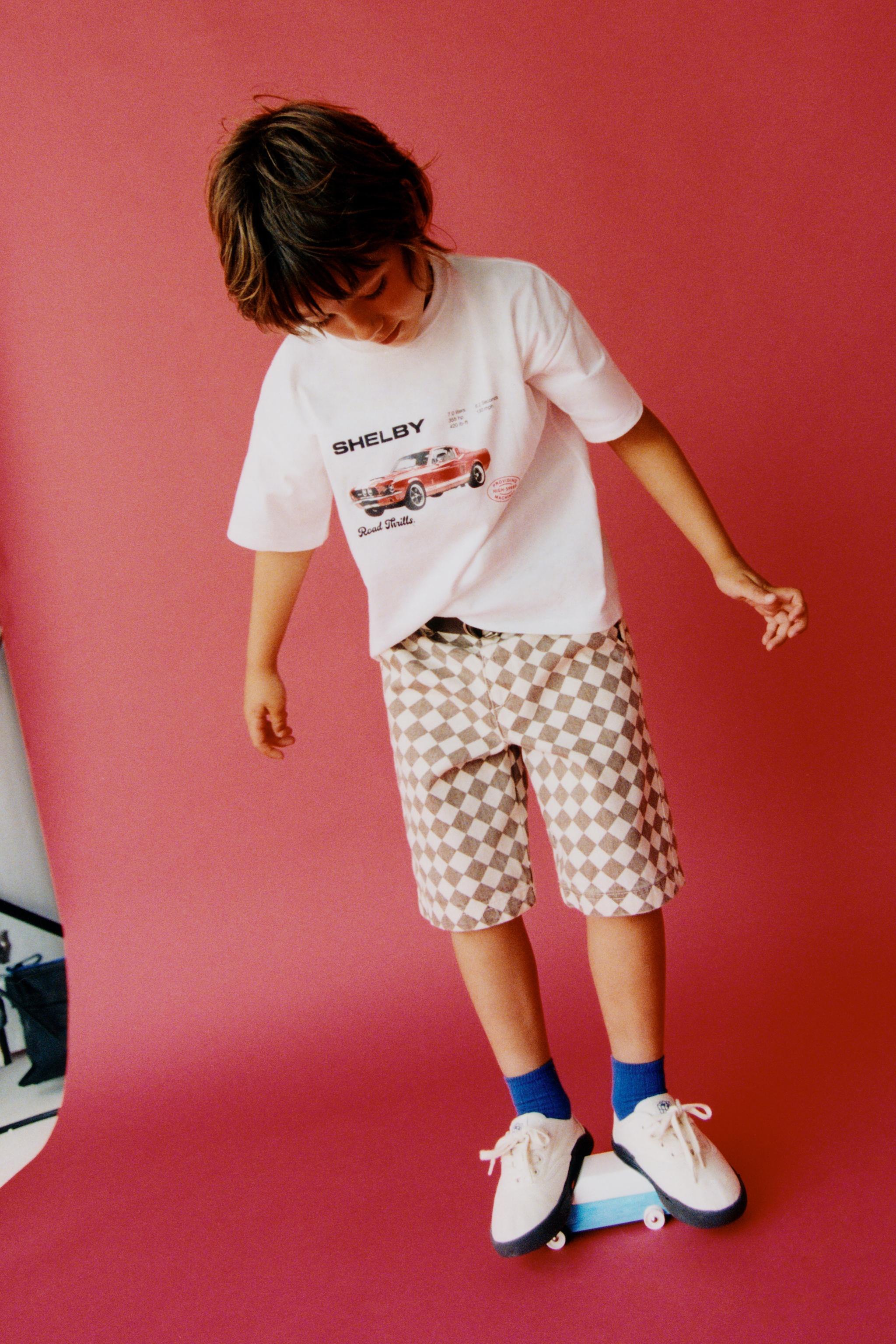 Shorts with elastic waistband and front snap button closure. Front pockets and back snap pockets.... | Zara US