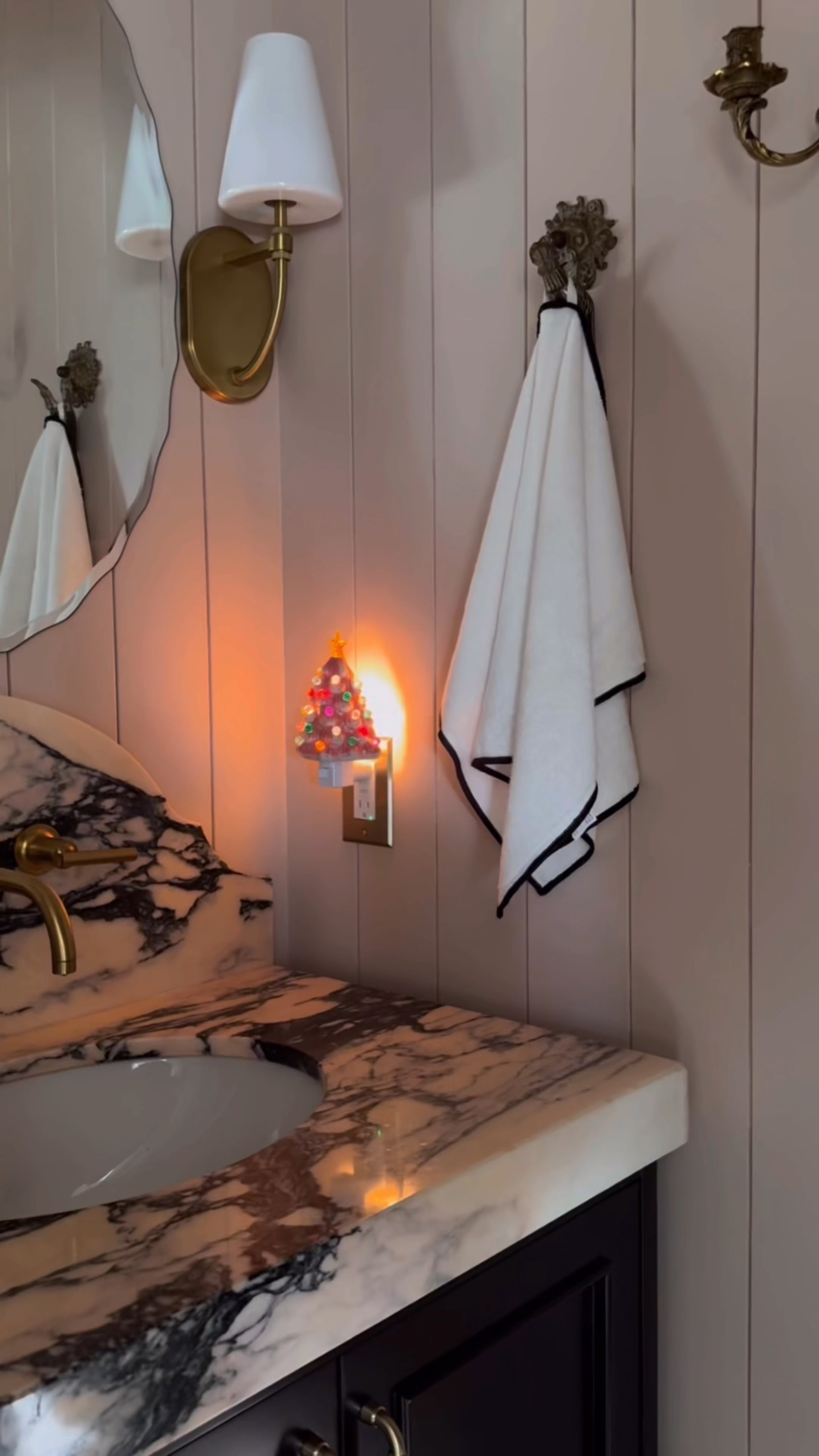 Shop my Christmas tree wall plug-in nightlight - it comes in green, white, and pink and looks just like the vintage ceramic Christmas trees your grandma used to have!  Super cute nostalgic retro Christmas decor! #christmas #christmasdecor #holidaydecor 

#LTKSeasonal #LTKHoliday #LTKHome