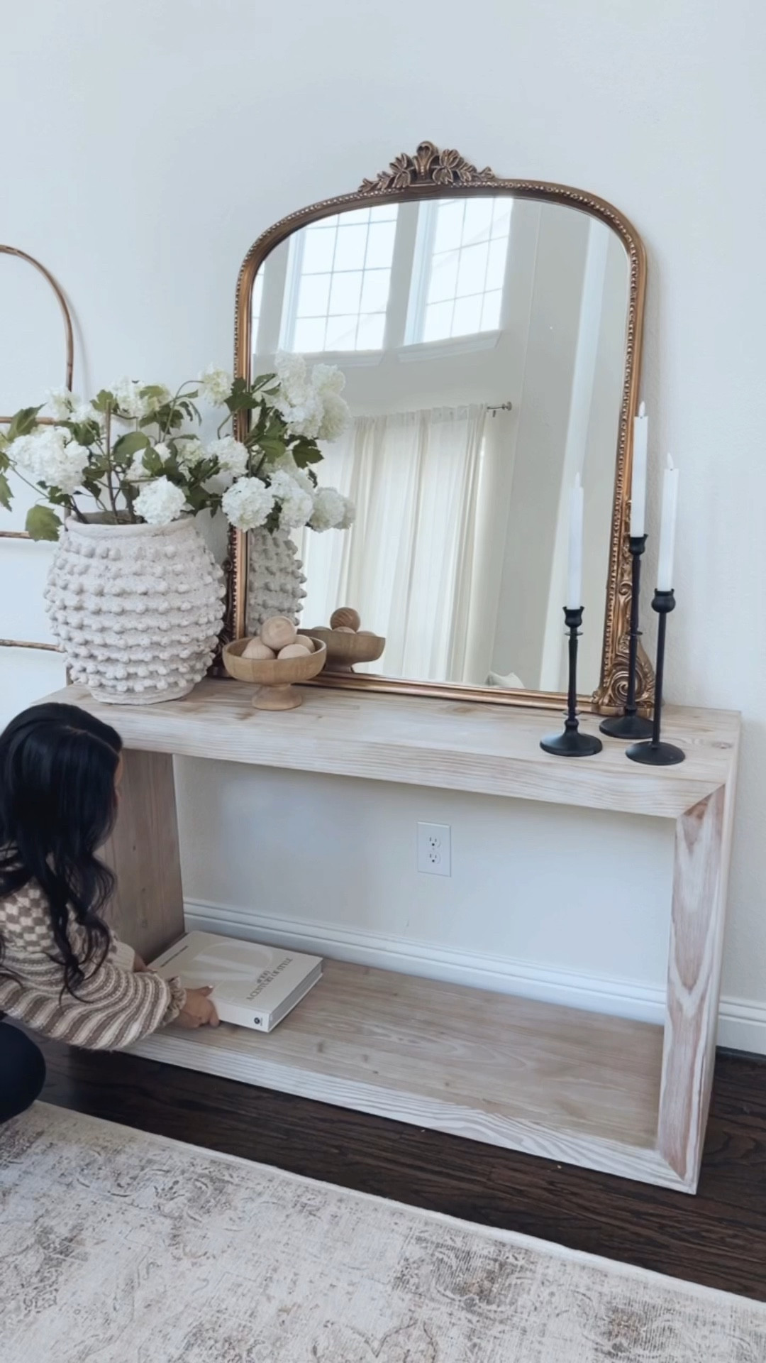 neutral entryway idea 🌿

decided that this area needed a subtle change! So I switched up the decor here with other things I had in my sala on my bookshelves, lil switcharoo if you will 🤭

anywho, here’s some details here:
+ opted for a grouping of three on the bottom
+ candleholders: pottery barn look for less from Amazon 
+ candles: battery operated and love them! 
+ textured vase: size large here
+ boxes, basket, books, pedestal bowl: Target
+ cute wooden balls: new home find I am loving

Everything here will be linked in my bio! What do you think? 🤍



#LTKhome #LTKunder50 #LTKFind