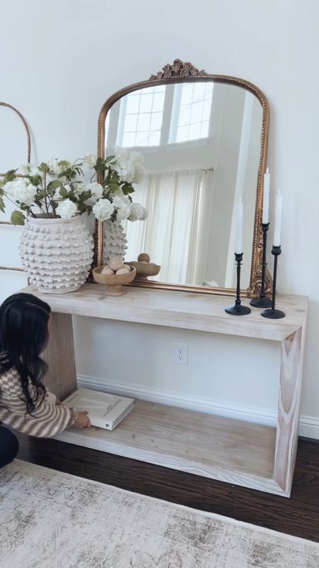 neutral entryway idea 🌿

decided that this area needed a subtle change! So I switched up the decor here with other things I had in my sala on my bookshelves, lil switcharoo if you will 🤭

anywho, here’s some details here:
+ opted for a grouping of three on the bottom
+ candleholders: pottery barn look for less from Amazon 
+ candles: battery operated and love them! 
+ textured vase: size large here
+ boxes, basket, books, pedestal bowl: Target
+ cute wooden balls: new home find I am loving

Everything here will be linked in my bio! What do you think? 🤍



#LTKhome #LTKunder50 #LTKFind