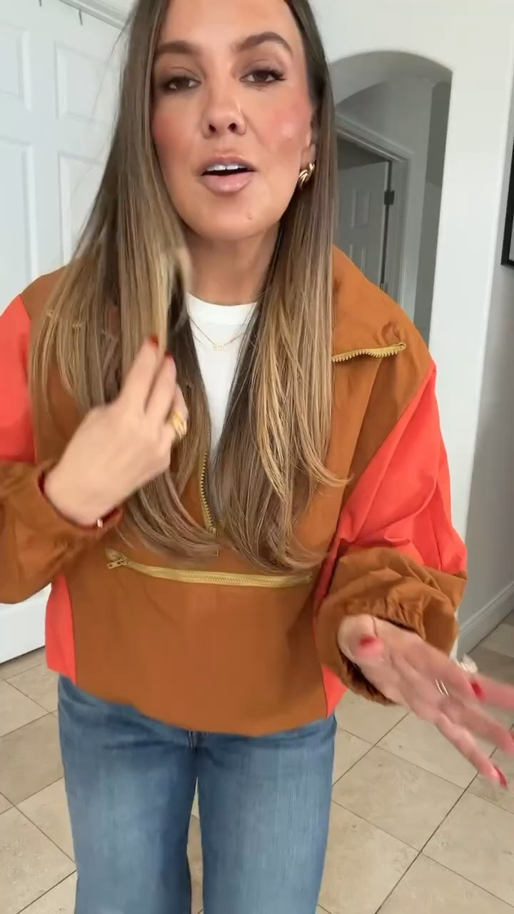 This windbreaker is amazing! The colors are beautiful and it’s extremely comfortable and affordable! 

Ash sizes:
Height: 5’6”
Weight: 140lbs
Tops: medium
Pants: 6, medium, 28