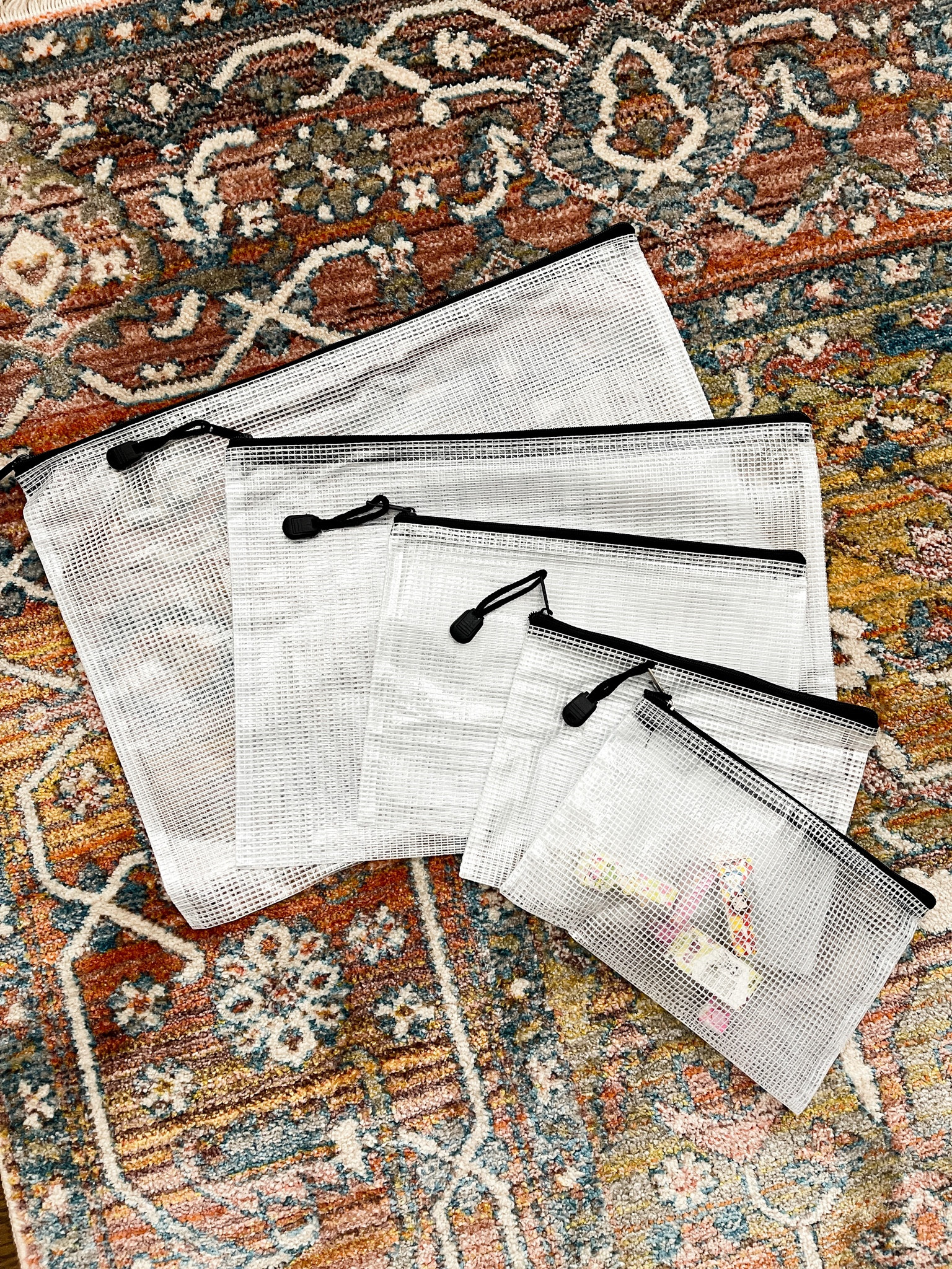These are the best mesh zipper bags to organize everything in your house! Perfect for toys, games, puzzles, your car, your purse, anywhere you need to organize!



#LTKunder50 #LTKhome