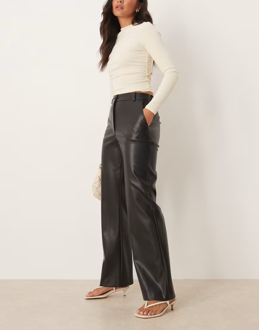 ASOS DESIGN faux leather straight leg pants in black | ASOS (Global)