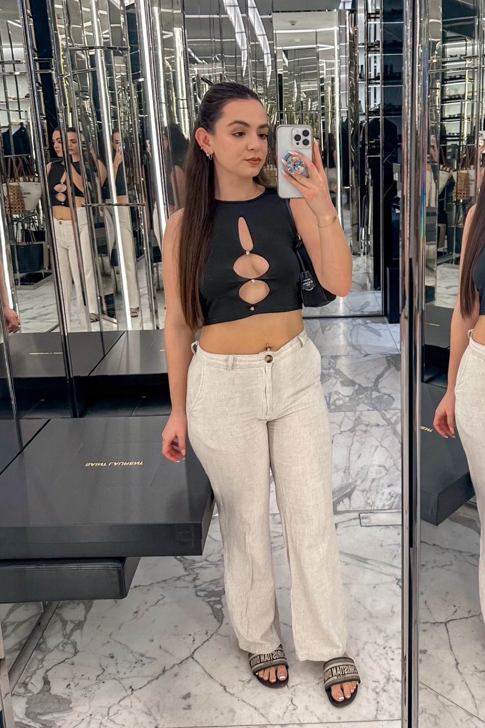 This outfit is such a comfortable simple yet sexy outfit to go shopping in. I wore this on my trip to Guadalajara while I was shopping in the andares shopping center. Black cutout tank crop top. Nude linen pants. Casual outfit. Vacation outfits. Brunch outfit.

#LTKfindsunder50 #LTKstyletip #LTKitbag