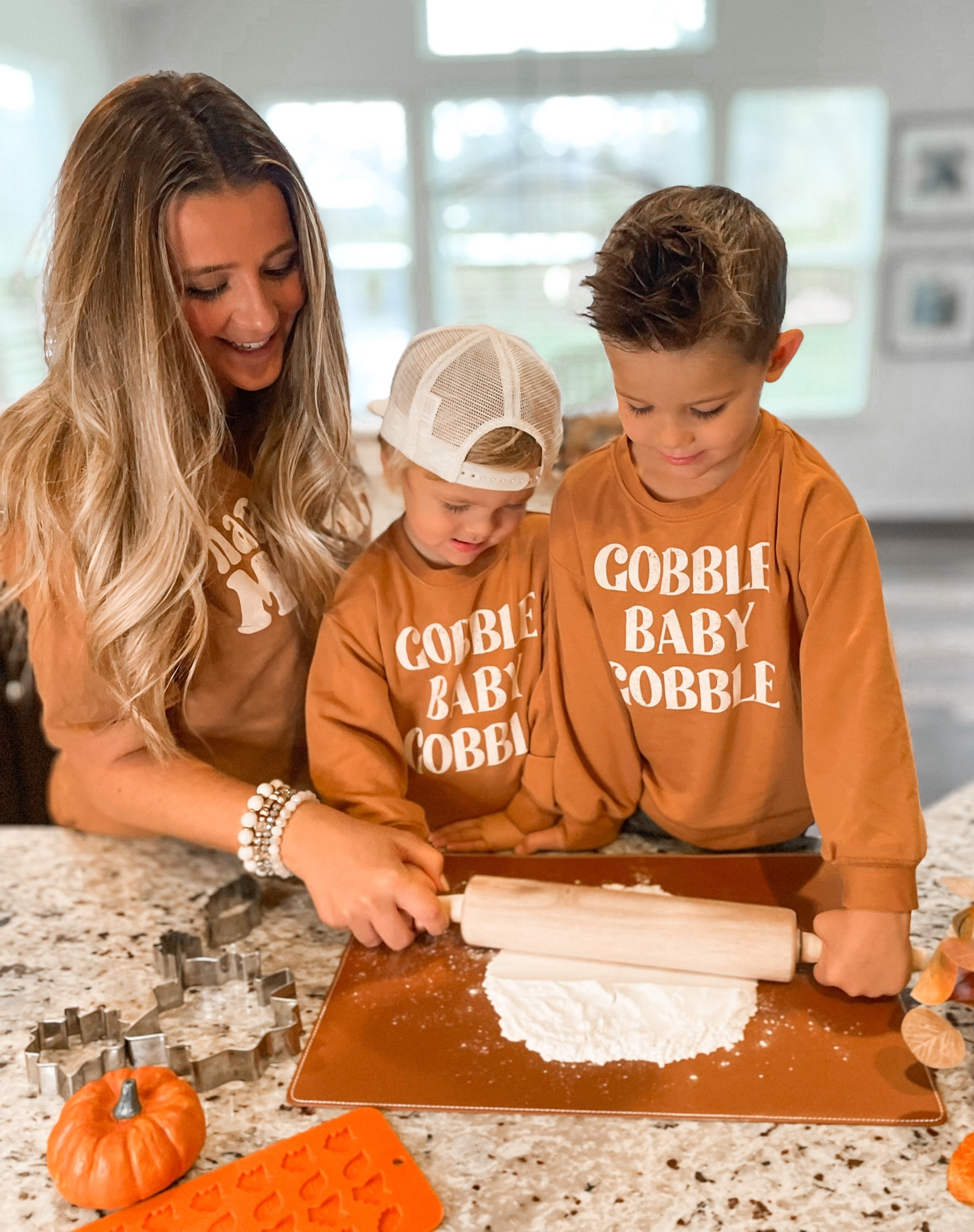 GOBBLE BABY GOBBLE! 🦃🍂 Cookie baking in our festive thanksgiving sweatshirts from Altar’d State! 

#LTKkids #LTKHoliday #LTKSeasonal