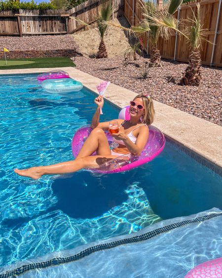 Pink bikini // Palm Springs outfit // Palm Springs bikini // vacation swimwear // bachelorette party outfit // bachelorette weekend // Palm Springs bachelorette // pool accessories// beach towel // Barbie outfit // Barbie core 

#LTKSeasonal #LTKswim #LTKstyletip