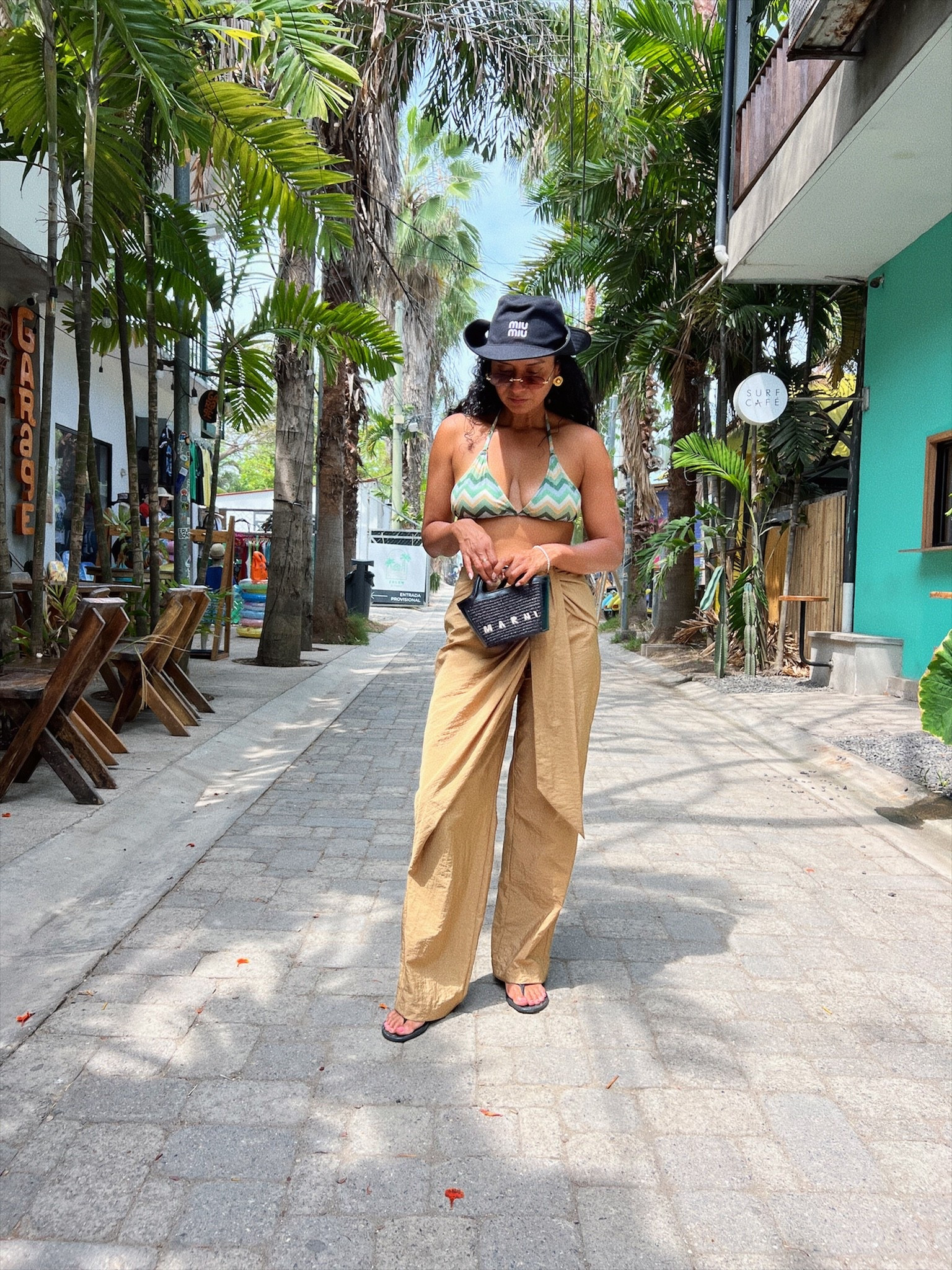 El Tunco El Salvador vacation style! Pants are Zara xs. Swim suit is Milly. Love the color and style. Hat is Mui Mui best purchase.