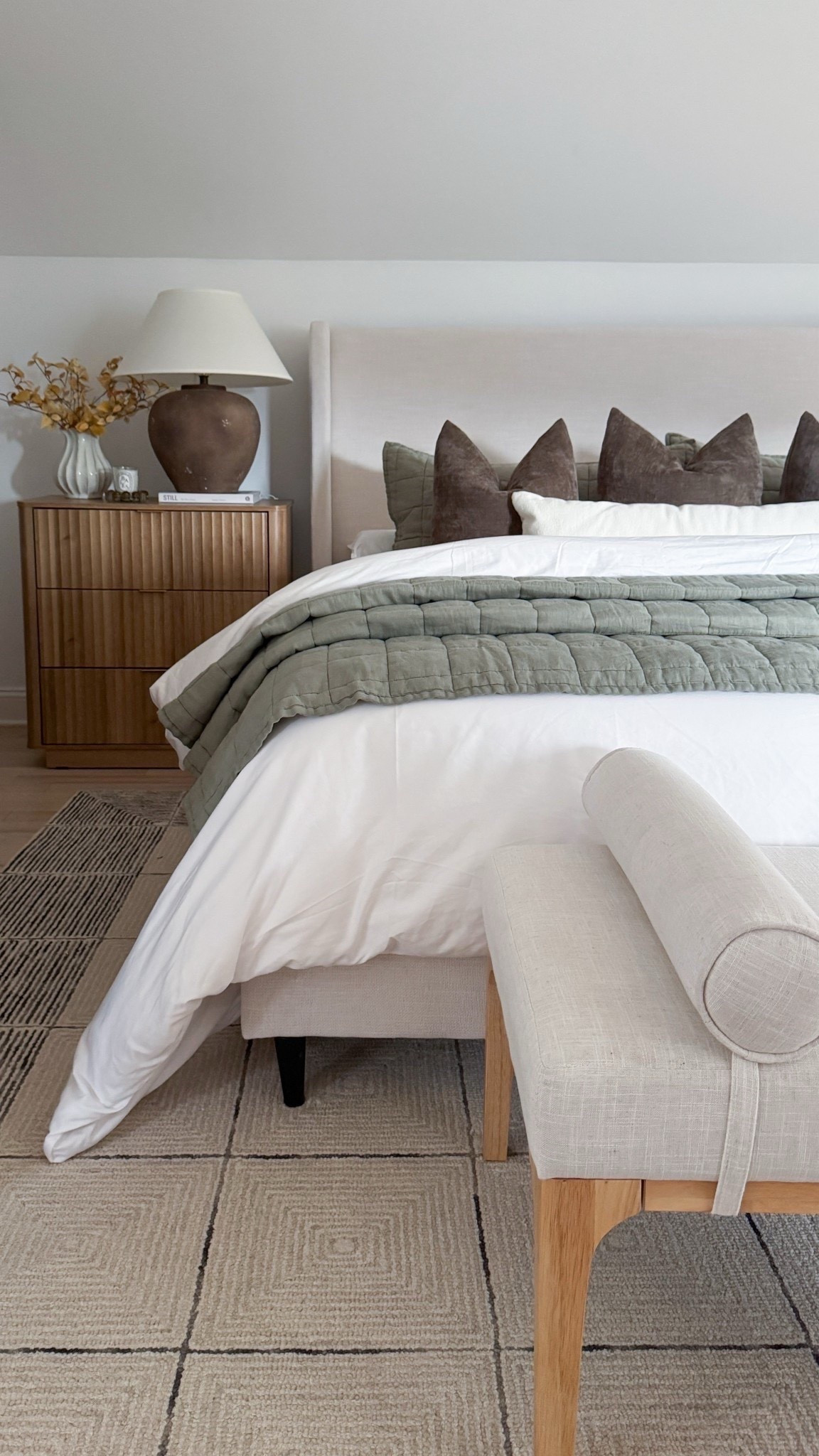 Neutral layers + cozy textures = my happy place 🤍 

This bedroom setup is filled with those designer-look-for-less pieces I always gravitate toward—clean, simple, and elevated without trying too hard. The green quilt adds such a soft pop of color against all the neutrals, and it might just be my favorite detail right now.



#neutralbedroom #cozyhomevibes #bedroomstyle #modernorganic #homedecor

#LTKHome #LTKSeasonal #LTKTall