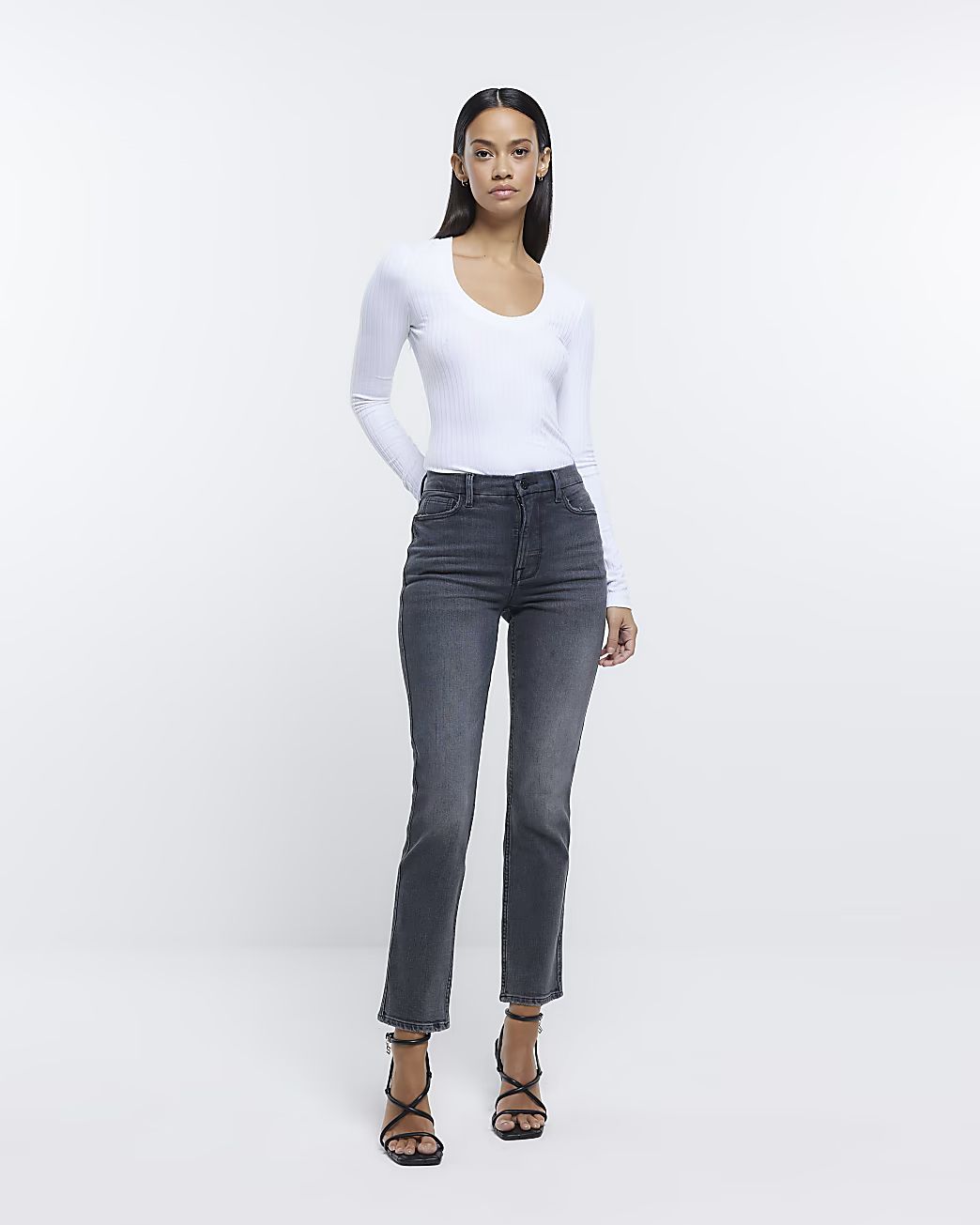 Black slim straight leg jeans | River Island (UK & IE)