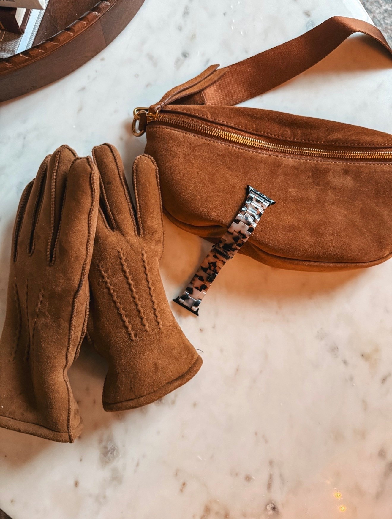 This brown suede crossbody bag would make the PERFECT gift for her! The gloves are so soft and chic and I love the tortoise shell Apple Watch band for the Fall! 

#LTKFindsUnder50 #LTKGiftGuide #LTKHoliday