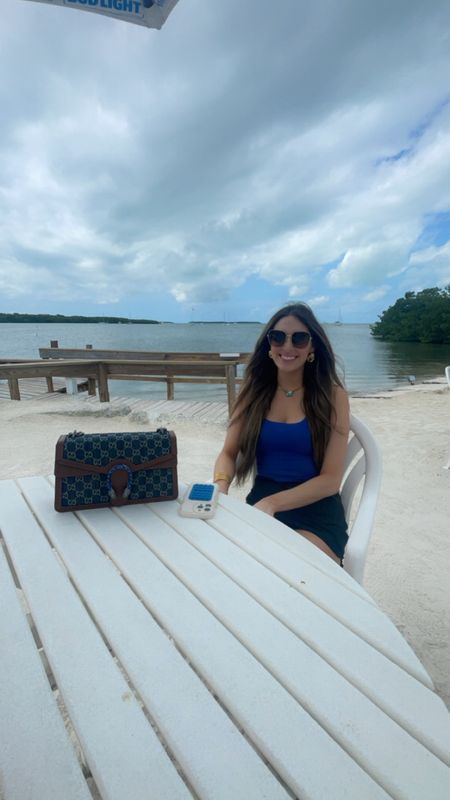Relaxed outfit for day 1 in the keys, Florida! I am wearing a small in the skims cotton rib tank (this color is cobalt and is currently sold out but I linked other colors!) and a small in the Halara skort - jewelry linked from revolve

#LTKtravel #LTKbeauty #LTKstyletip