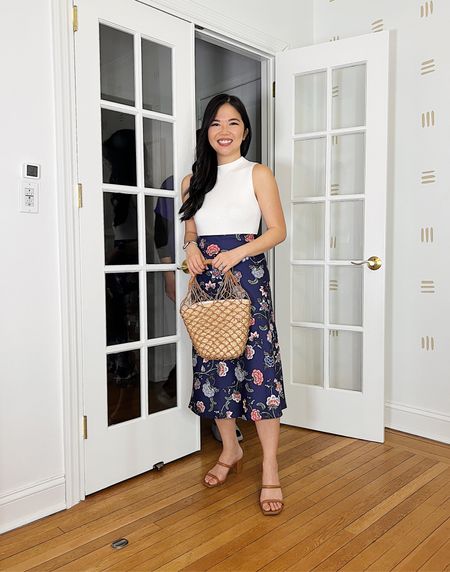 White mock neck top (XS)
Navy floral midi skirt  (XSP)
Straw bucket bag 
Brown mule sandals (TTS)
Ann Taylor 
LOFT
J.Crew Sedona bag
Target fashion 
Spring outfit 
Spring work outfit 
Business casual outfit 

#LTKFind #LTKworkwear #LTKSeasonal