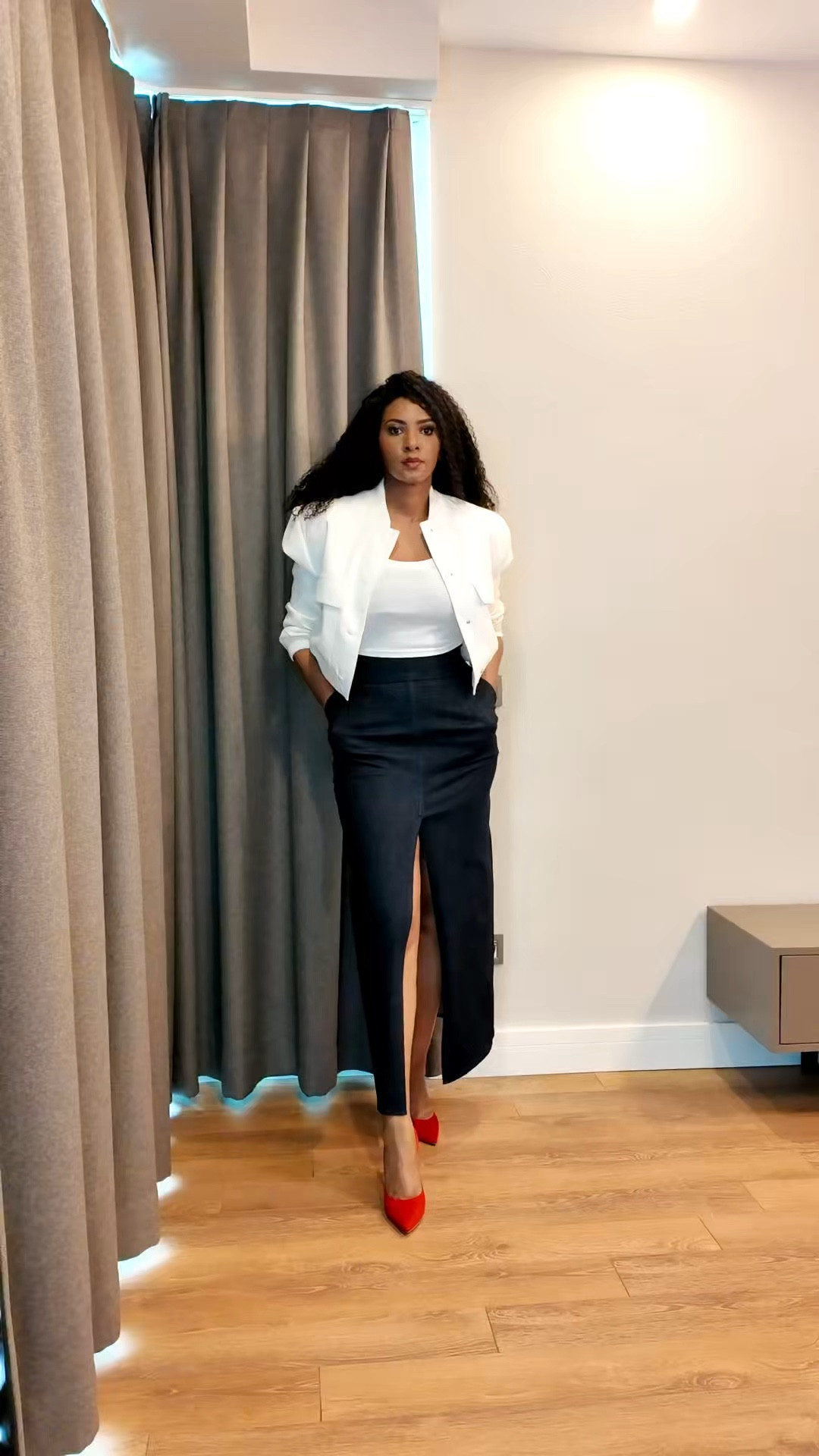 A skirt with a front slit. I am here for it. 

LTKAroundTheWorld #LTKstyletip #LTKpartywear