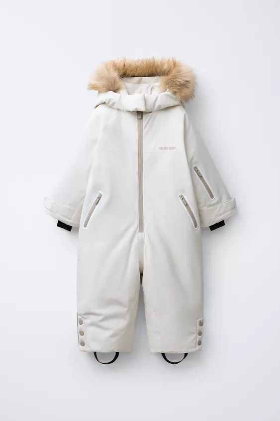 WATER RESISTANT AND WINDPROOF RECCO® SYSTEM SKI COLLECTION LONG JUMPSUIT WITH FAUX FUR HOODIE | Zara US