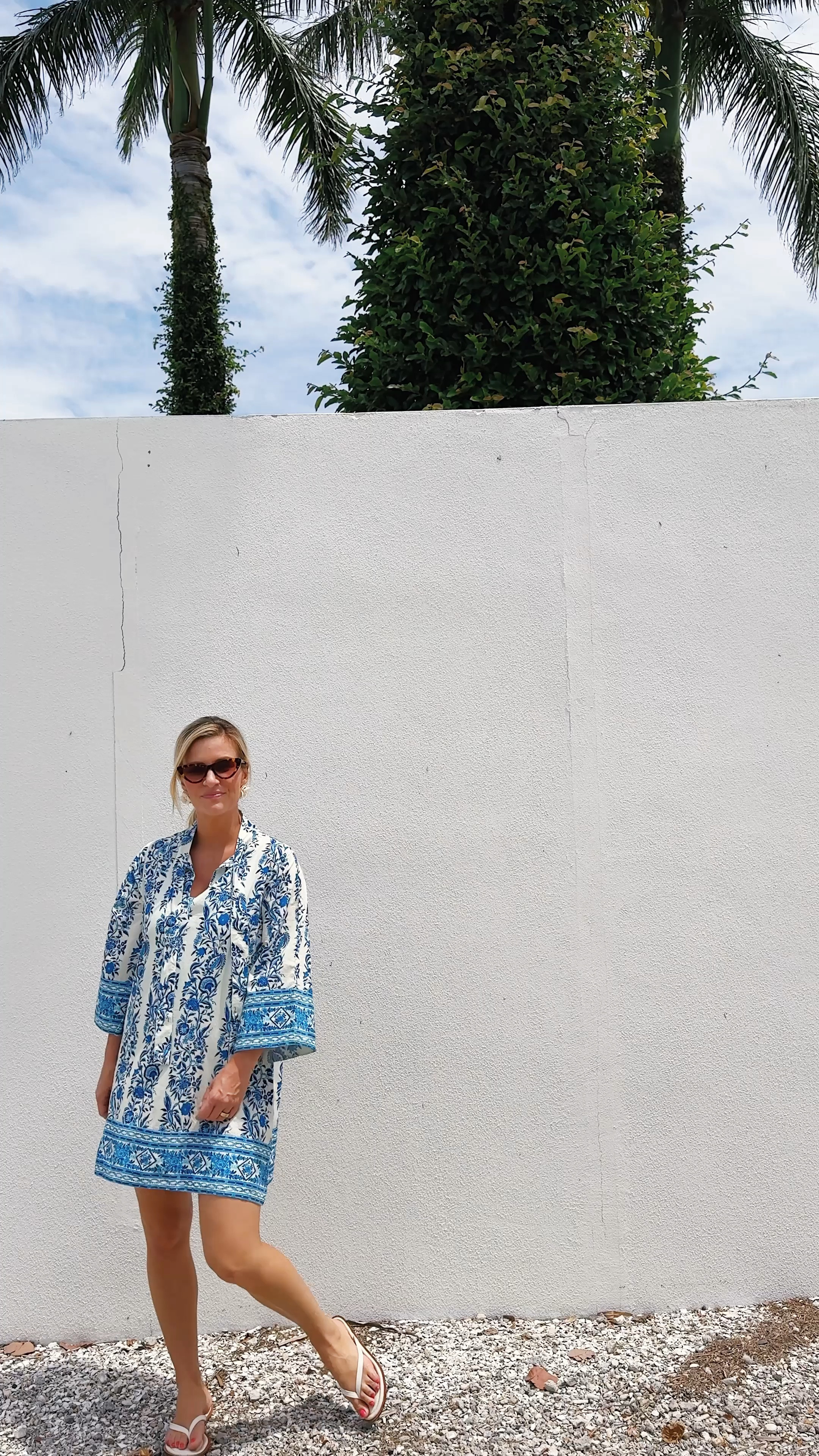 Blue & white swim coverup that doubles as a tunic dress! Size down as it runs large.

#LTKSeasonal #LTKSwim #LTKOver40