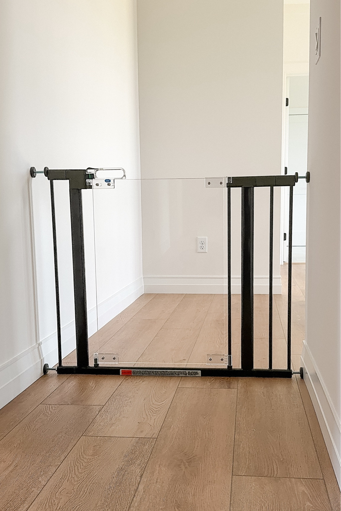 Here's a sleek solution for childproofing your home without compromising on style. This baby gate fits seamlessly into any modern home, keeping your little ones safe while maintaining a clean, minimal look.

#LTKBaby #LTKFamily #LTKHome