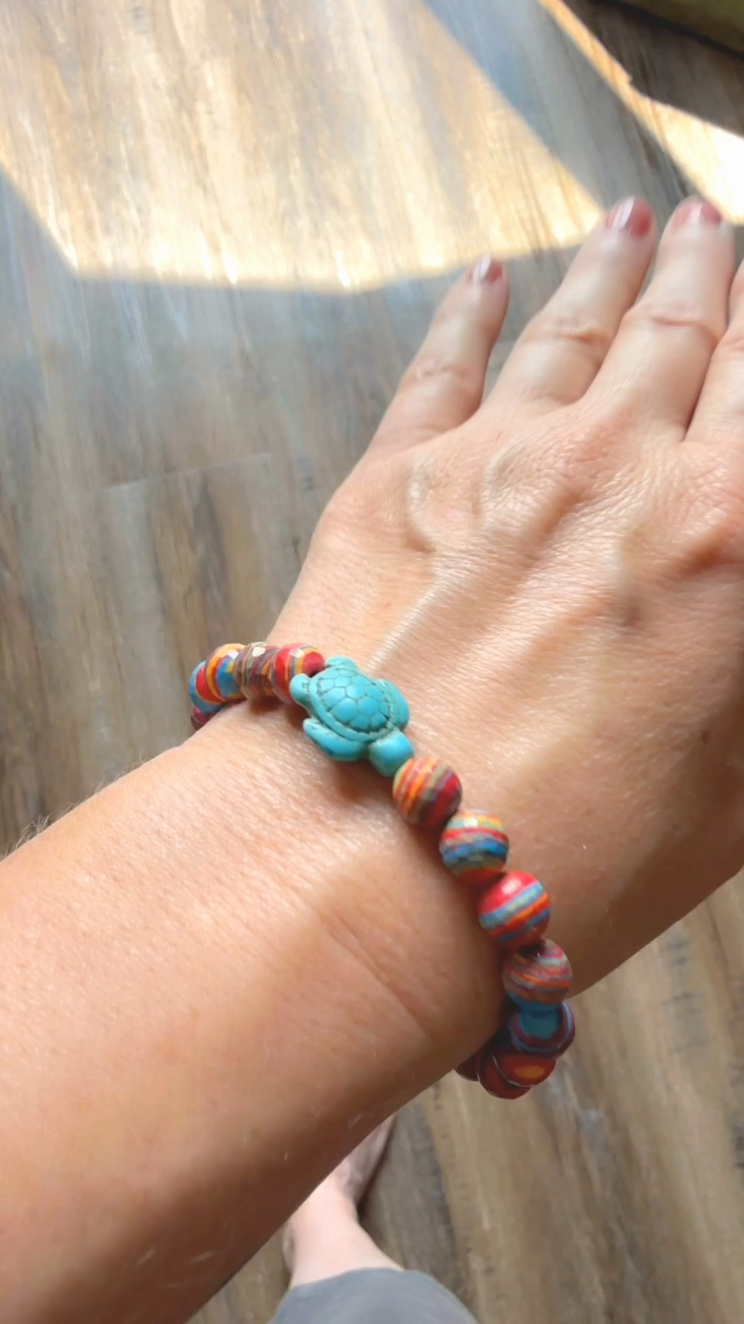 Obsessed with this adorable turtle beaded stretch bracelet! The vibrant multi-color rainbow beads and cute turquoise sea turtle charm give off the perfect boho beachy vibe. Ideal for layering into a colorful bracelet stack or wearing solo as a fun, everyday summer accessory. Makes a cute, budget-friendly gift idea for summer outfit styling, beach trips, and vacation outfits! PLUS it comes with a tracker for your very own turtle - you can see where they are on the globe.

Style: Boho Chic, Coastal Grandma, Beach Wear, Resort Wear, Summer Fashion, Everyday Casual

Features: Turtle Charm, Turquoise Bead, Beaded Stretch Bracelet, Rainbow Striped Beads, Colorful Jewelry, Wristwear

Occasions: Beach Vacation, Festival Fashion, Summer Outfits, Pool Day, Daily Wear, Gift Ideas

#LTKunder50 #LTKunder25 #LTKshoecrush #LTKswim #LTKtravel #LTKstyletip #LTKfinds #BohoJewelry #BeadedBracelet #TurtleBracelet #BeachWear #SummerStyle #ColorfulJewelry #VacationOutfit #BraceletStack #JewelryAddict 

 #LTKdayinmylife #LTKmomlife #LTKTravel