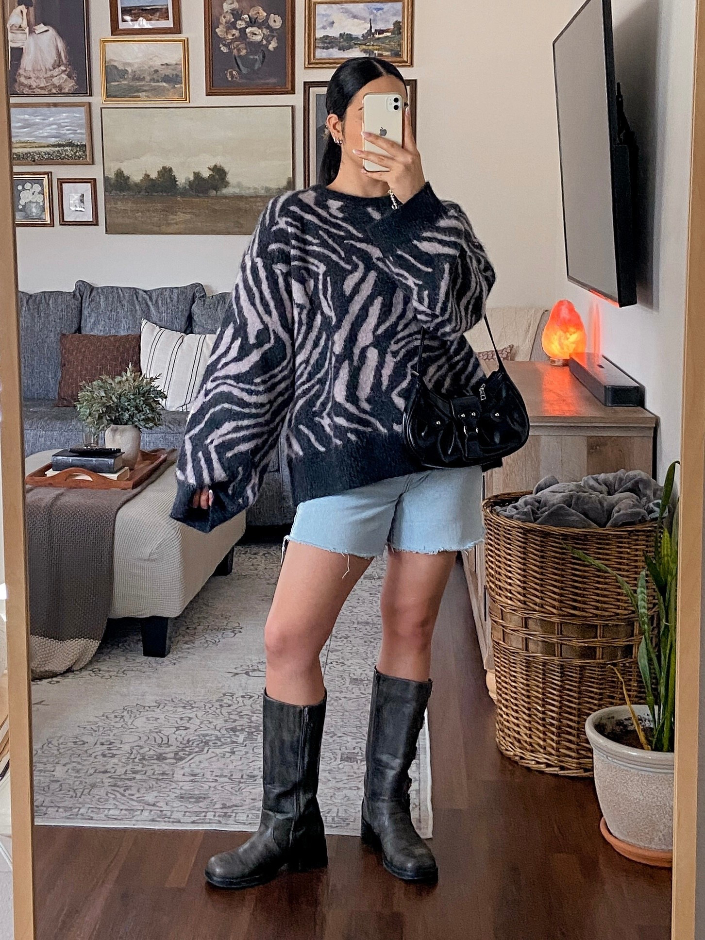 me 🤝 cozy oversized sweaters // this GANNI sweater is from my rent the runway subscription box picks for this month. check out rent the runway (link in bio) and use code RTRXJMELGOZA50 for a big discount!! rent the runway • monthly clothing subscription ➡️ https://www.renttherunway.com/?utm_source=affiliate&utm_medium=cirqle&utm_campaign=jessicamelgoza_&utm_term=560855 ✨✨ ootd video, zebra print sweater outfit, oversized sweater aesthetic, animal print fall outfit, baggy denim shorts style, cut off shorts outfit, moto boots outfit, edgy fall fashion, black y2k shoulder bag, y2k outfit inspo, trendy fall outfit, casual edgy style, street style outfit video, fall fashion inspo 2025, fall outfit aesthetic, cozy edgy outfit, everyday fashion vlog, outfit of the day aesthetic, fall street style vibes, fashion reel inspo, trendy outfit video, aesthetic ootd content, outfit of the day, outfit ideas, casual fall outfits, texas fall outfits, texas fall style, transitional style,  

 #LTKCyberWeek #LTKGiftGuide #LTKHoliday