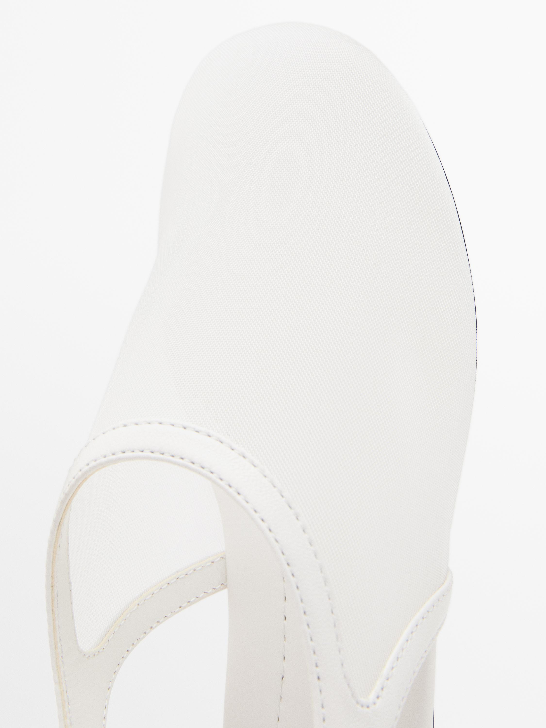 Round toe. Made of mesh fabric. Backless. Elastic side detail for a comfortable fit. | Massimo Dutti UK