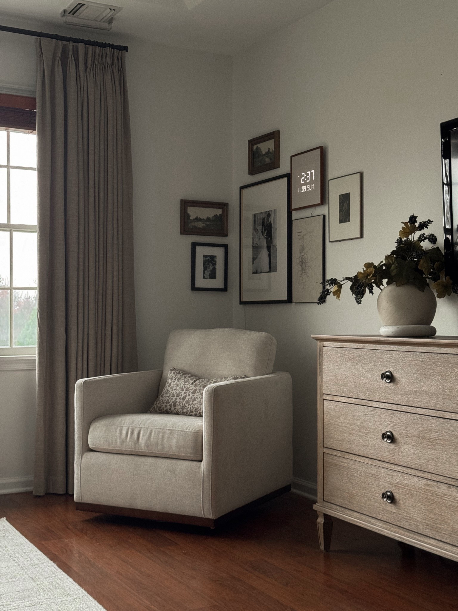 Favorite bedroom corner 😍

Curtain details: 
Color: Grey Beige
Lining type: 100% Blackout 
Header style: Pinch pleat - triple

Homerilla curtains, Amazon curtains, bedroom decor, primary bedroom, accent chair, bedroom corner, Bedroom accent chair, Amazon curtains, bedroom dresser, wall clock

#LTKHome