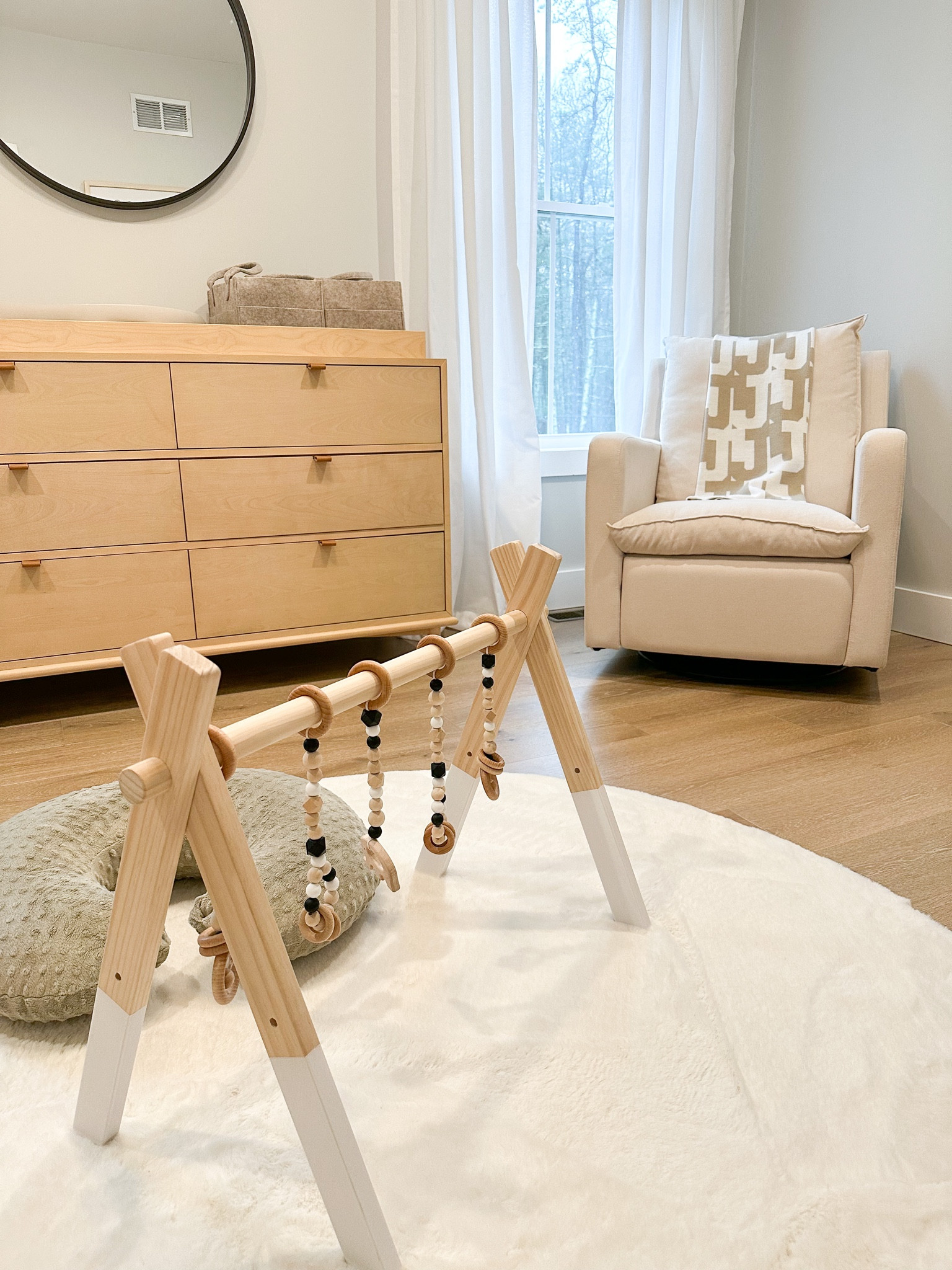 Neutral baby nursery 

• baby room, west elm crib, west elm changing table, target black round mirror, Amazon finds, Amazon olive tree, keekaroo peanut changing pad, buy buy baby, Babylist, baby registry, pottery barn kids, diaper caddy, gathre moon pillow, leather pillow, faux fur round rug, baby style, nursery decor, hatch sound machine, target white floor length curtain panels, wooden poppyseed play gym, amazon recliner, initial blanket, boppy cover 

#LTKkids #LTKbaby #LTKhome