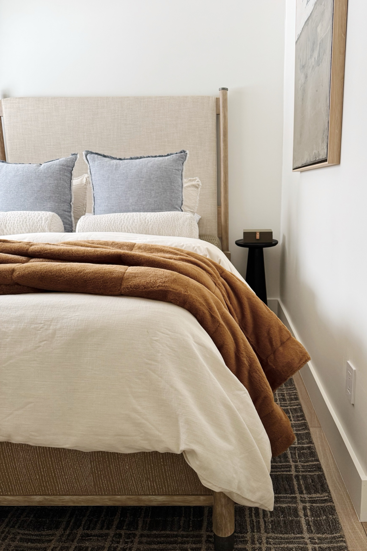 Cozy guest bedroom with earthy and organic inspired color palette, upholstered bed and modern art. #guestroom #neutralbedroom #bedroom

#LTKHome #LTKFindsUnder100