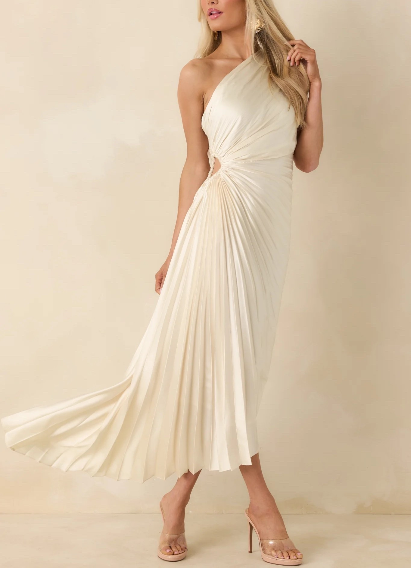 Inspired by European minimal romantic elegance, this light ivory asymmetric one-shoulder maxi dress features a sculpted silhouette that feels refined and intentional. The asymmetrical neckline adds modern structure while the flowing skirt keeps the look soft and graceful. Under $100, and take 25% site wide with the code MEMORIAL25.

Suggested clutch and sandals linked below.

Keywords:

* ivory maxi dress
* one shoulder maxi dress
* asymmetric maxi dress
* formal maxi dress
* wedding guest dress summer
* evening gown
* minimalist formal dress
* elegant white dress
* romantic maxi dress
* sculptural dress
* special occasion dress
* cocktail formal dress
* refined evening dress
* modern evening gown

#LTKTravel #LTKWedding #LTKootd