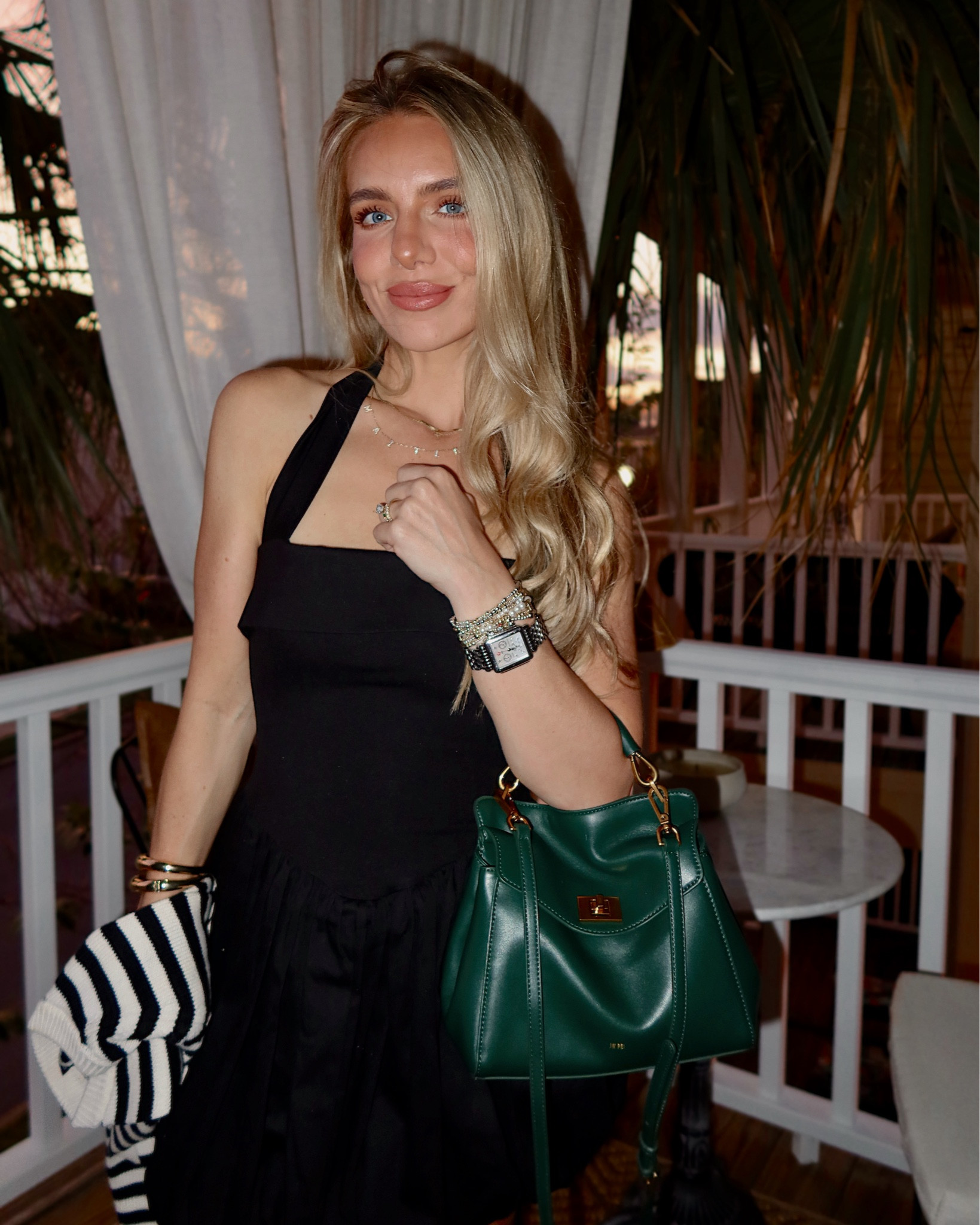 The perfect dark green fall bag! Deep emerald forest green, buttery soft faux leather, price on point! Beautiful gold hardware, removable crossbody strap, and lots of room!!! From JW PEI. Also linked everything else! Little black bubble halter dress, black and white stripe cardigan, and fab cow print ballet flats!

#LTKItBag #LTKFindsUnder100 #LTKSeasonal