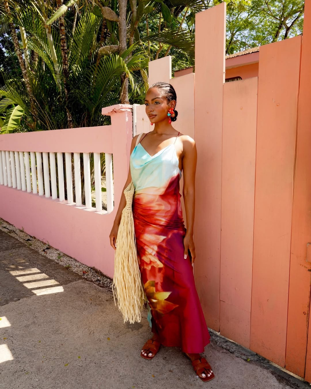 Sun-drenched and effortlessly refined, this vacation look is all about elevated ease with a touch of coastal glamour. A silky satin dress from AKIRA flows with every step, blending rich blue and vibrant orange tones that mirror ocean waves meeting a glowing sunset. The fabric catches the light beautifully, giving that soft, luminous sheen that feels both luxe and relaxed.

Paired with a textured straw beach handbag, the look leans into that carefree, jet-set energy—perfect for seaside strolls or a golden hour dinner by the water. The natural tones of the bag ground the boldness of the dress, creating a balanced, effortlessly chic aesthetic.

Finished with radiant gold glam from Charlotte Tilbury, the beauty look ties everything together—think sun-kissed skin, warm metallic highlights, and a soft glow that enhances rather than competes. It’s the kind of look that feels polished without trying too hard… like you just stepped off a plane and into your best life. ✨

Vacation outfit, vacation fashion, vacation style looks, vacation ootd, resort wear, resortwear fashion, resortwear outfit, satin dress, beach day outfit, beach day ootd, black girl fashion, black girl outfit 
, summer fashion, summer ootd, summer outfits, summer fashion style

@AKIRA 

#LTKdayinmylife #LTKTall #LTKootd