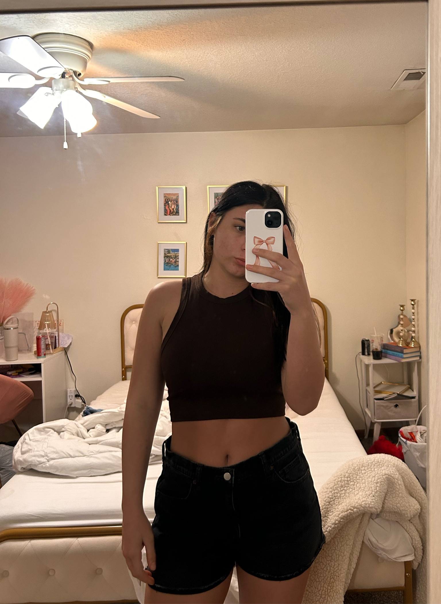 Brown top with black jean shorts 