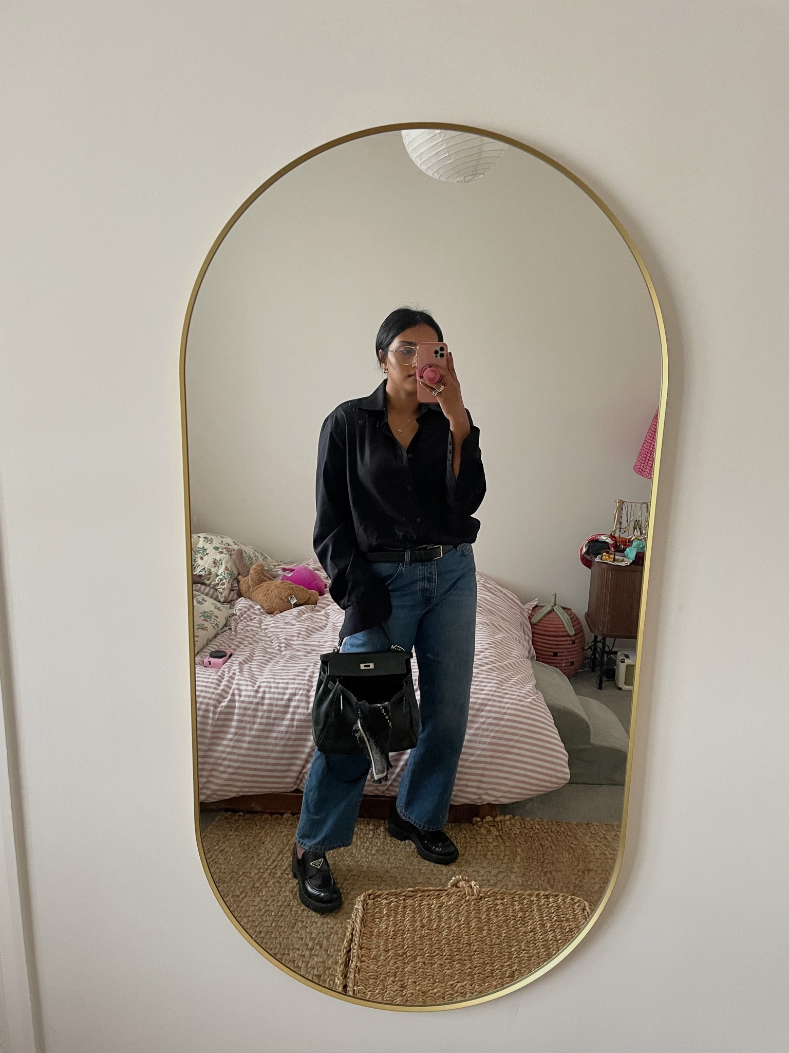 Black shirt for party season 
Party shirt 
Petite jeans 
The row jeans 

#LTKpartywear #LTKluxury #LTKworkwear