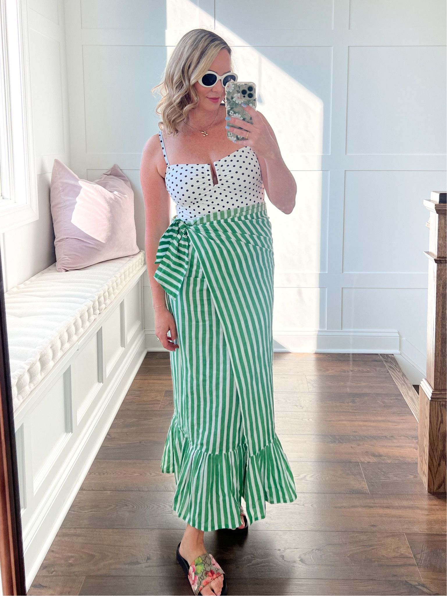 My swimsuit is on major sale! Wearing size medium for reference also loving this cover-up wrap. My sunglasses are Amazon! 

#LTKFindsUnder100 #LTKSwim #LTKTravel