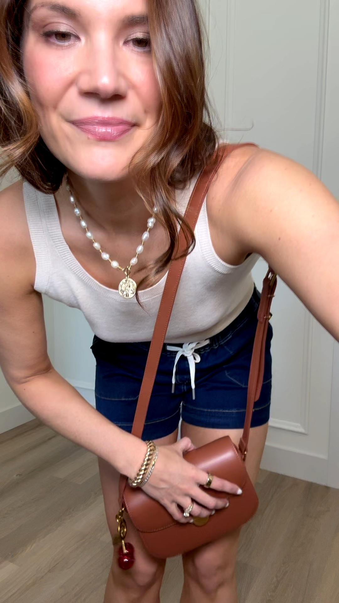 I love this sweater tank. You can wear a regular bra, the neckline is modest, and the slim fit makes it easy to tuck in or wear out. It instantly feels more elevated than a basic tank. Wearing a size large and it comes in several neutral colors.

sweater tank, elevated basics, modest neckline top, regular bra friendly top, slim fit tank, easy layering piece, neutral wardrobe staple, everyday outfit top, spring layering top, Stang and co

#LTKootd #LTKTall #LTKSeasonal